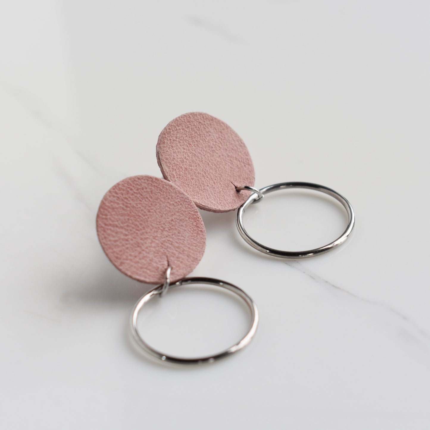 Handmade, light weight and comfortable to wear all day long leather earrings. All our earring hooks are made with a high quality stainless steel and they are hypo allergenic. They will not tarnish or irritate your sensitive skin.