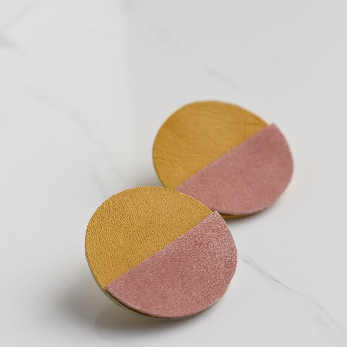 Handmade, light weight and comfortable to wear all day long leather earrings. All our earring hooks are made with a high quality stainless steel and they are hypo allergenic. They will not tarnish or irritate your sensitive skin.