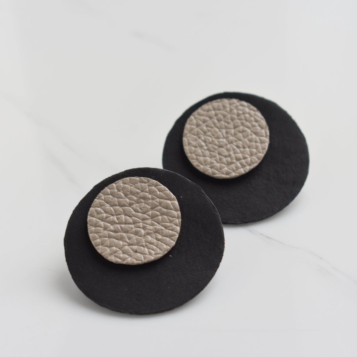 Handmade, light weight and comfortable to wear all day long leather earrings. All our earring hooks are made with a high quality stainless steel and they are hypo allergenic. They will not tarnish or irritate your sensitive skin.