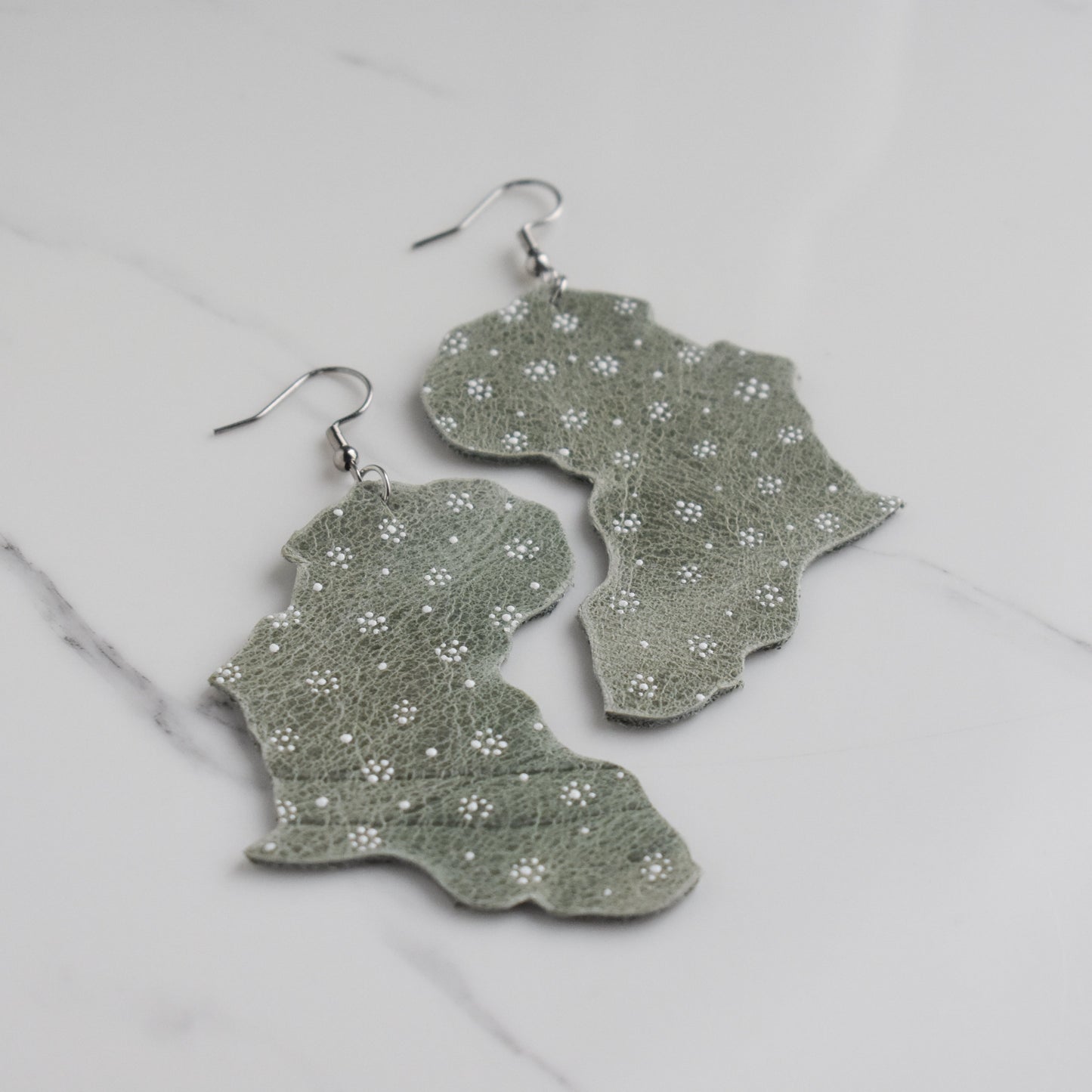 Handmade, light weight and comfortable to wear all day long leather earrings. All our earring hooks are made with a high quality stainless steel and they are hypo allergenic. They will not tarnish or irritate your sensitive skin.