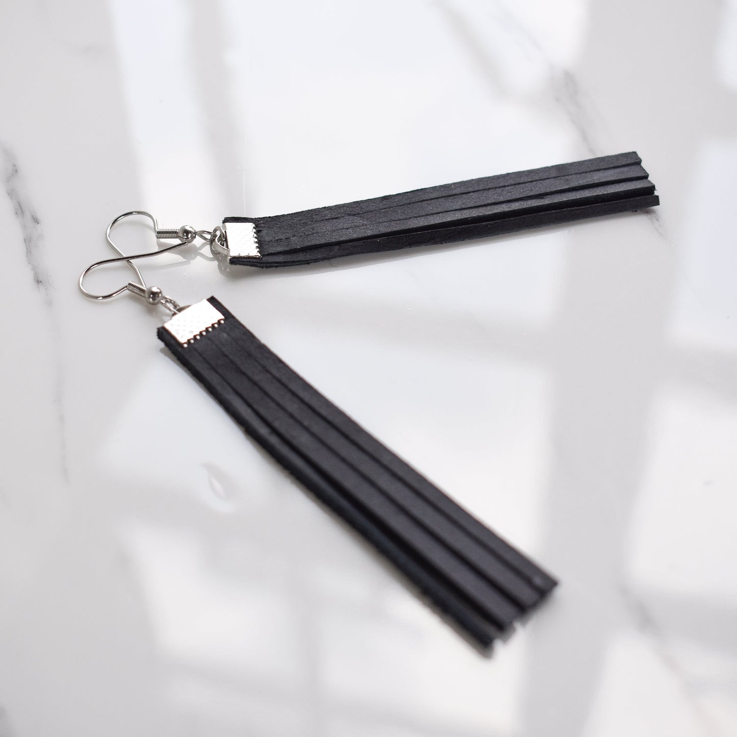 Handmade, light weight and comfortable to wear all day long leather earrings. Available in silver or rose gold. All our earring hooks are made with a high quality stainless steel and they are hypo allergenic. They will not tarnish or irritate your sensitive skin.
