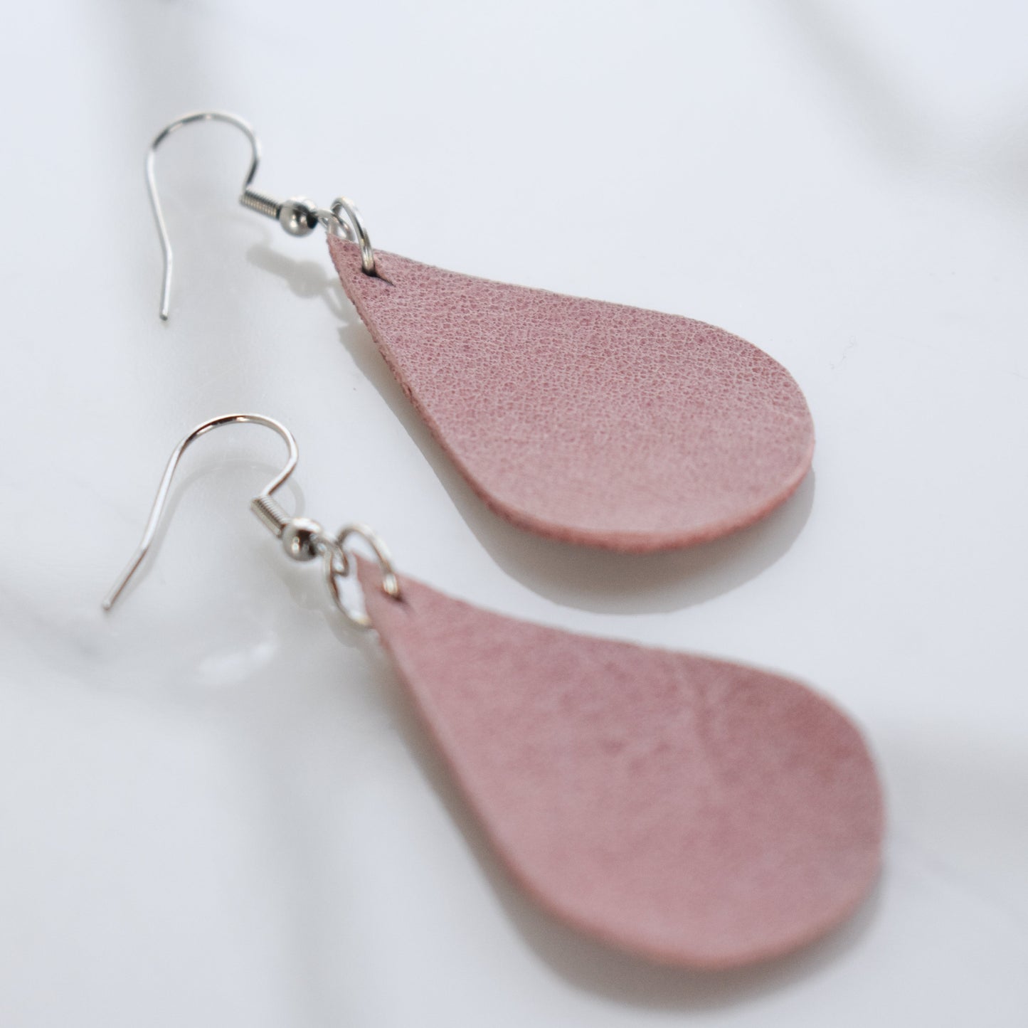 Handmade, light weight and comfortable to wear all day long leather earrings. All our earring hooks are made with a high quality stainless steel and they are hypo allergenic. They will not tarnish or irritate your sensitive skin.