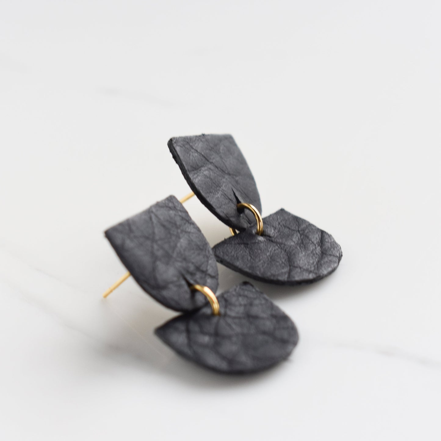 Handmade, light weight and comfortable to wear all day long leather earrings. All our earring hooks are made with a high quality stainless steel and they are hypo allergenic. They will not tarnish or irritate your sensitive skin.