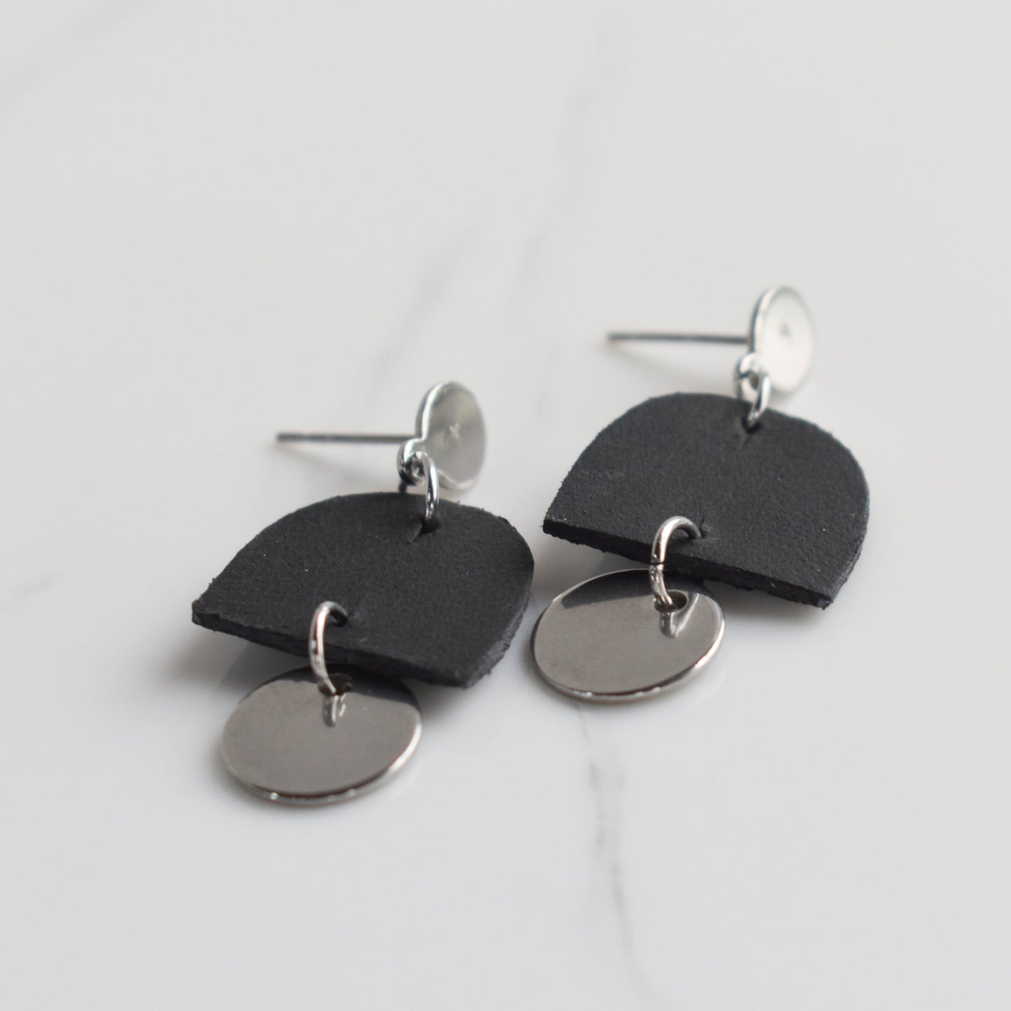 Handmade, light weight and comfortable to wear all day long leather earrings. All our earring hooks are made with a high quality stainless steel and they are hypo allergenic. They will not tarnish or irritate your sensitive skin.