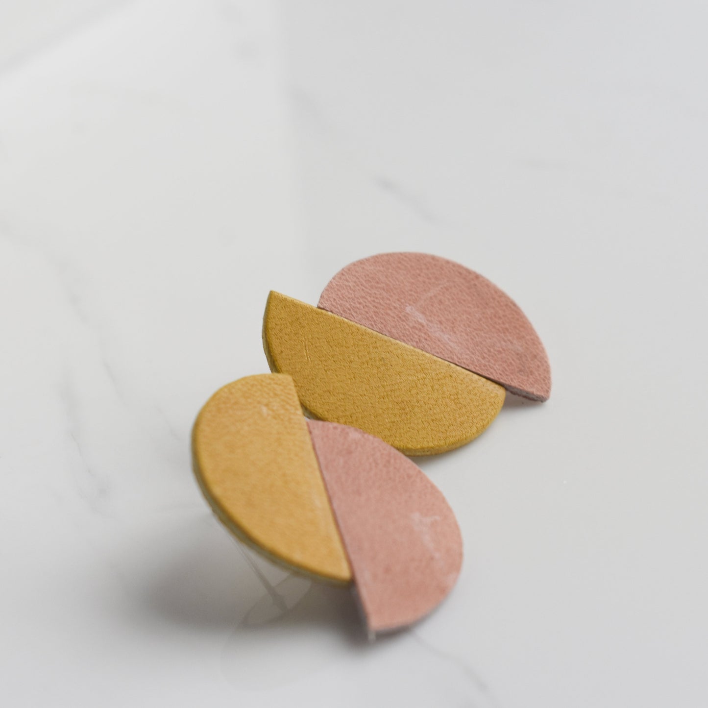 Handmade, light weight and comfortable to wear all day long leather earrings. All our earring hooks are made with a high quality stainless steel and they are hypo allergenic. They will not tarnish or irritate your sensitive skin.