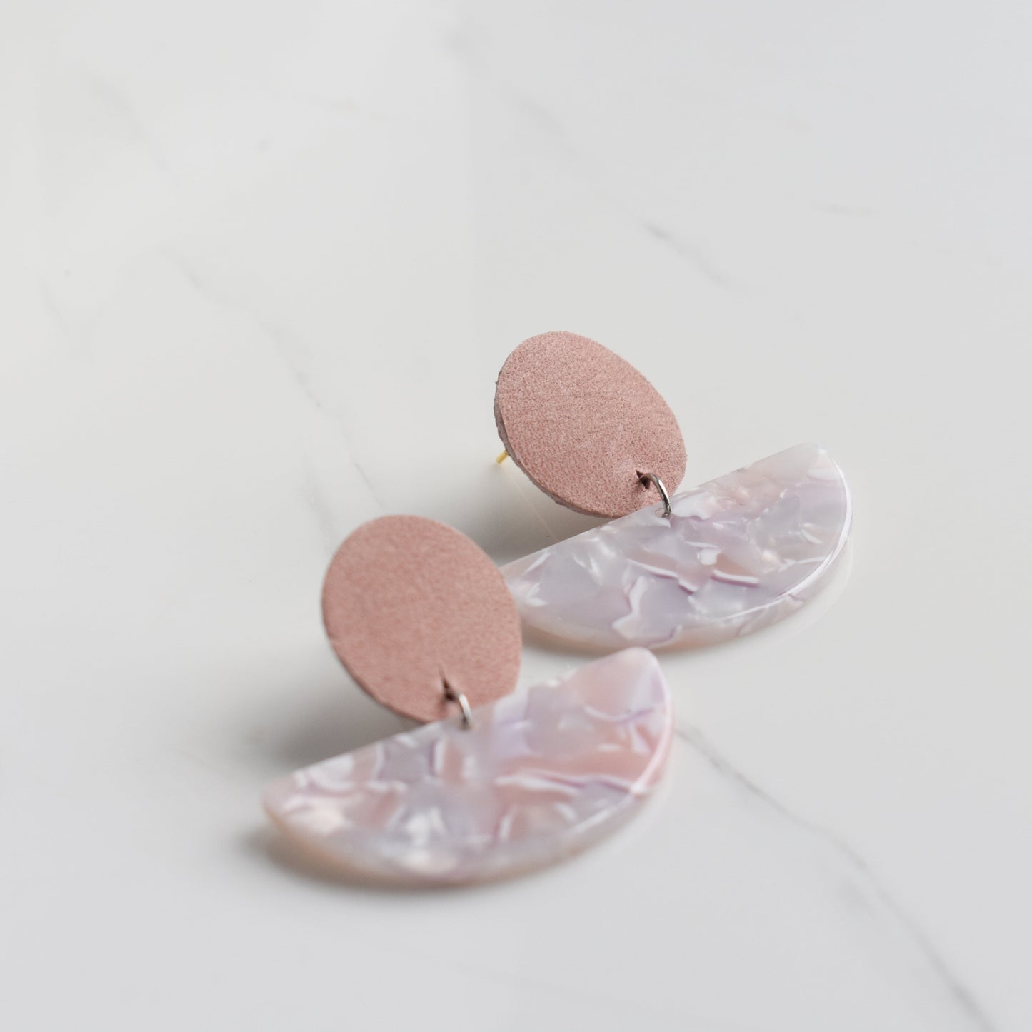 Handmade, light weight and comfortable to wear all day long leather earrings. All our earring hooks are made with a high quality stainless steel and they are hypo allergenic. They will not tarnish or irritate your sensitive skin.