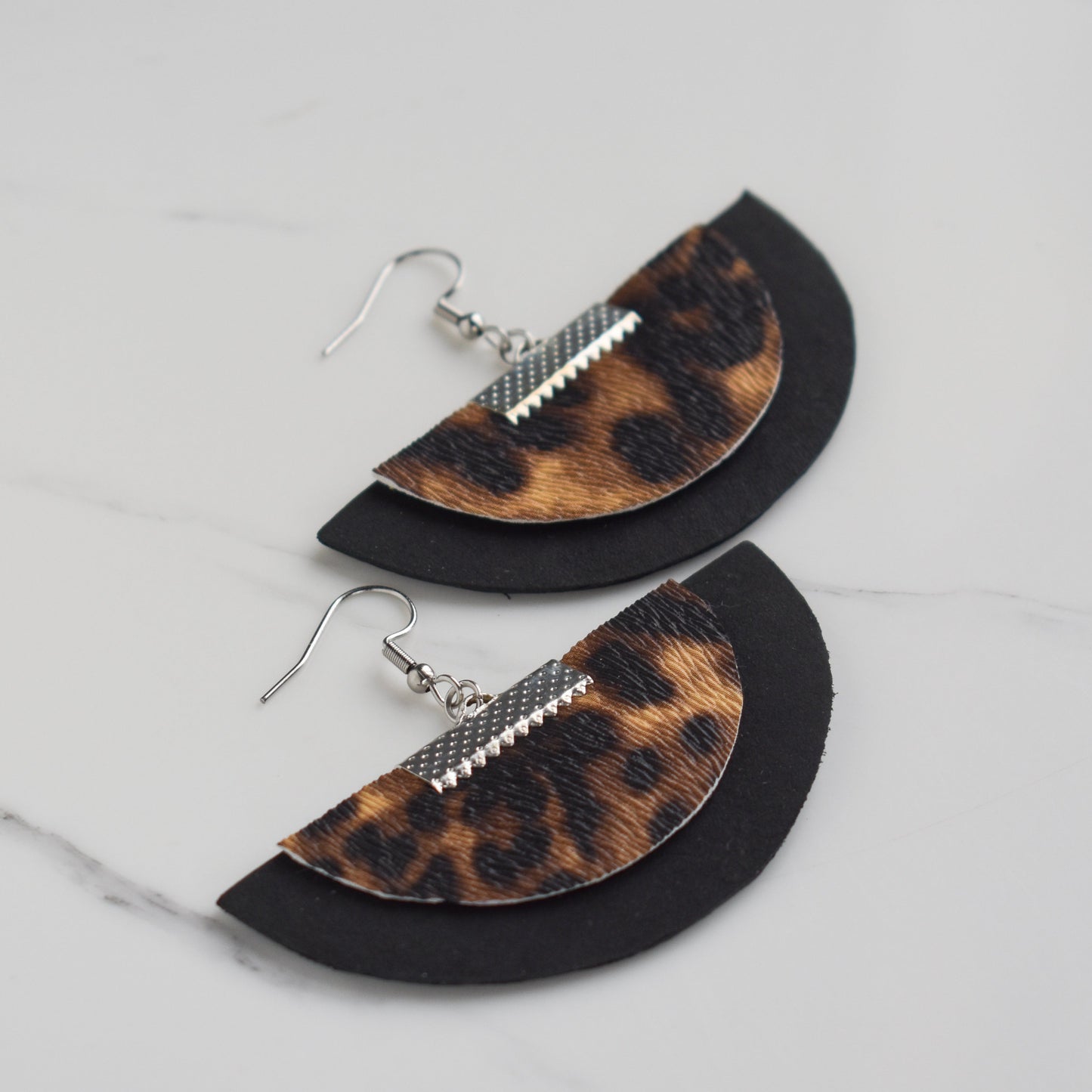 Handmade, light weight and comfortable to wear all day long leather earrings. All our earring hooks are made with a high quality stainless steel and they are hypo allergenic. They will not tarnish or irritate your sensitive skin.