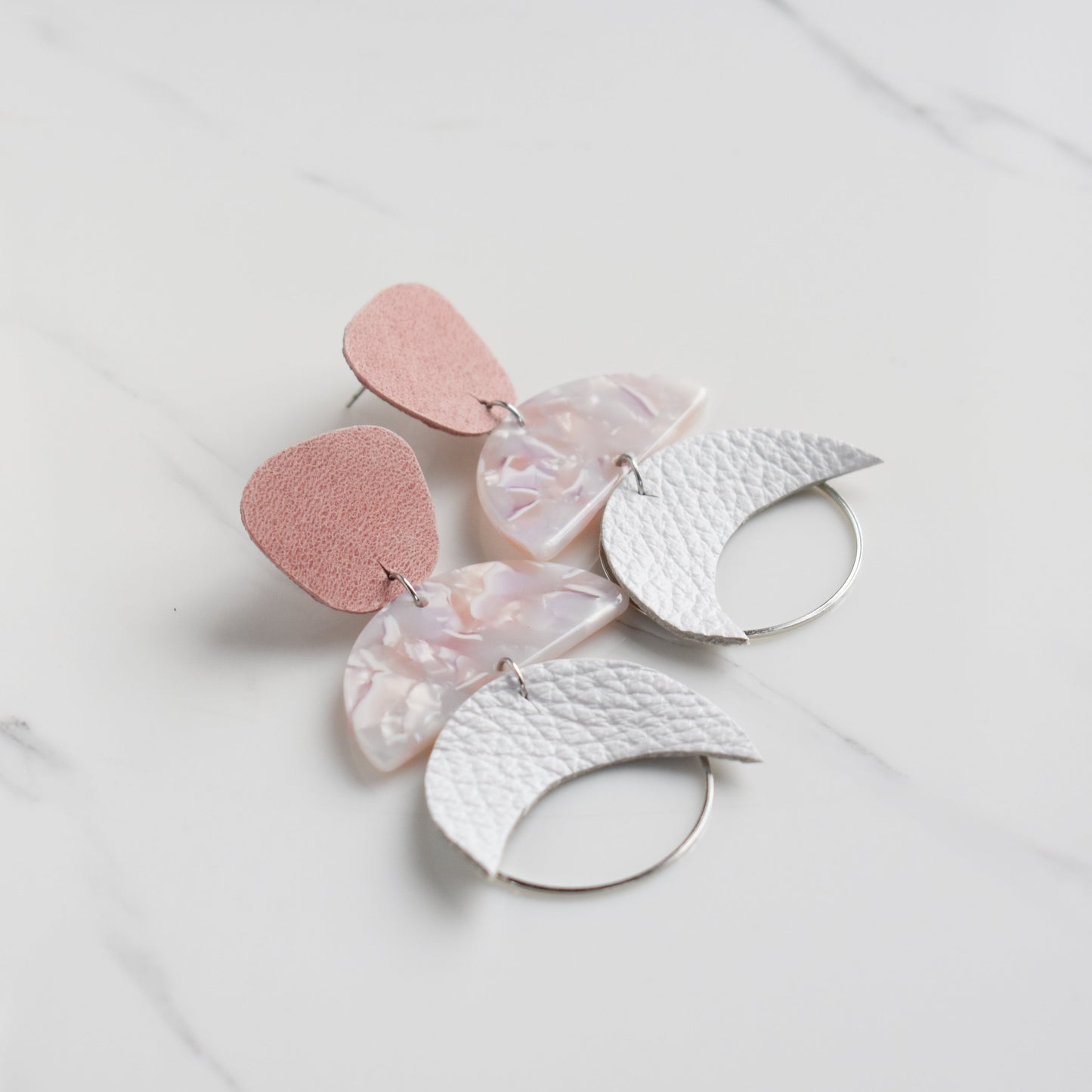 Handmade, light weight and comfortable to wear all day long leather earrings. All our earring hooks are made with a high quality stainless steel and they are hypo allergenic. They will not tarnish or irritate your sensitive skin.