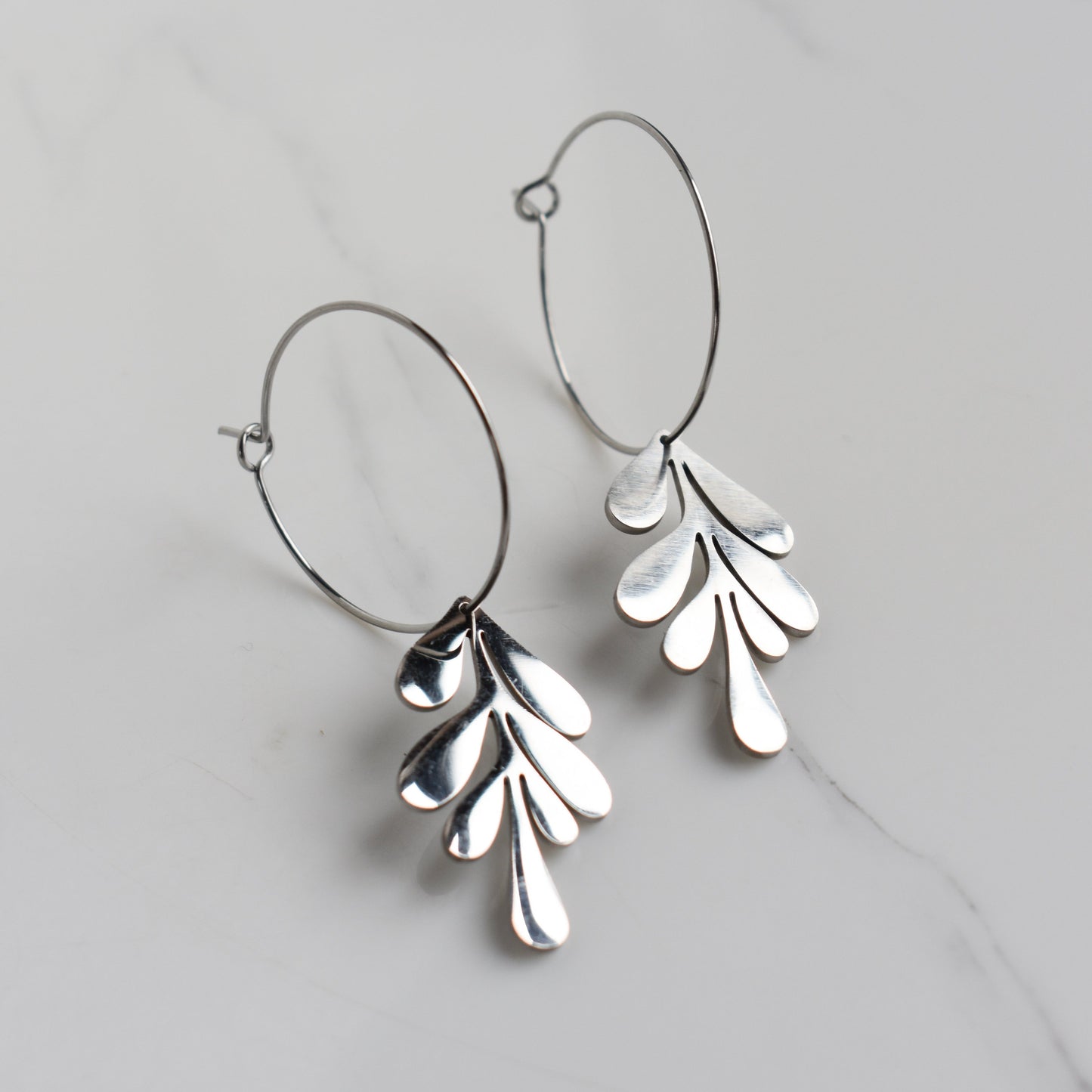 Handmade, light weight and comfortable to wear all day long leather earrings. All our earring hooks are made with a high quality stainless steel and they are hypo allergenic. They will not tarnish or irritate your sensitive skin.