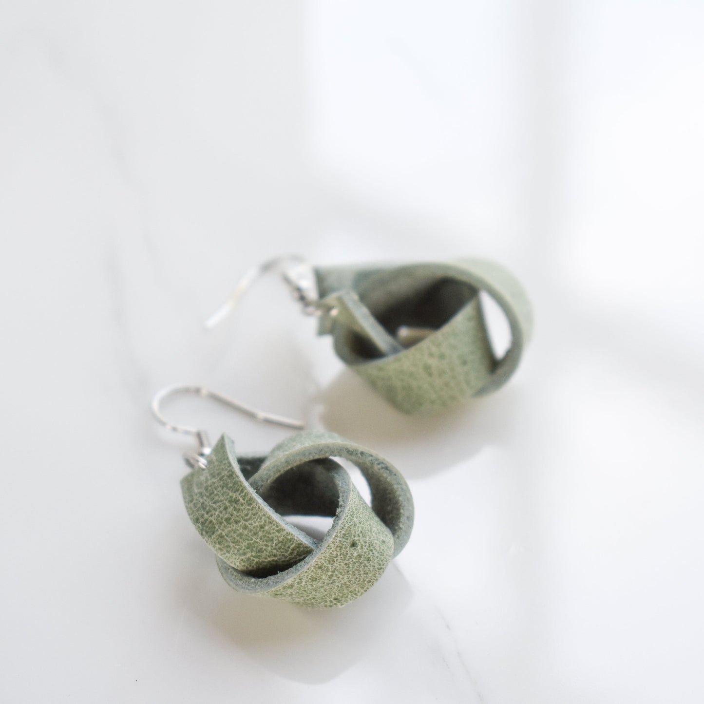 Handmade, light weight and comfortable to wear all day long leather earrings. All our earring hooks are made with a high quality stainless steel and they are hypo allergenic. They will not tarnish or irritate your sensitive skin.