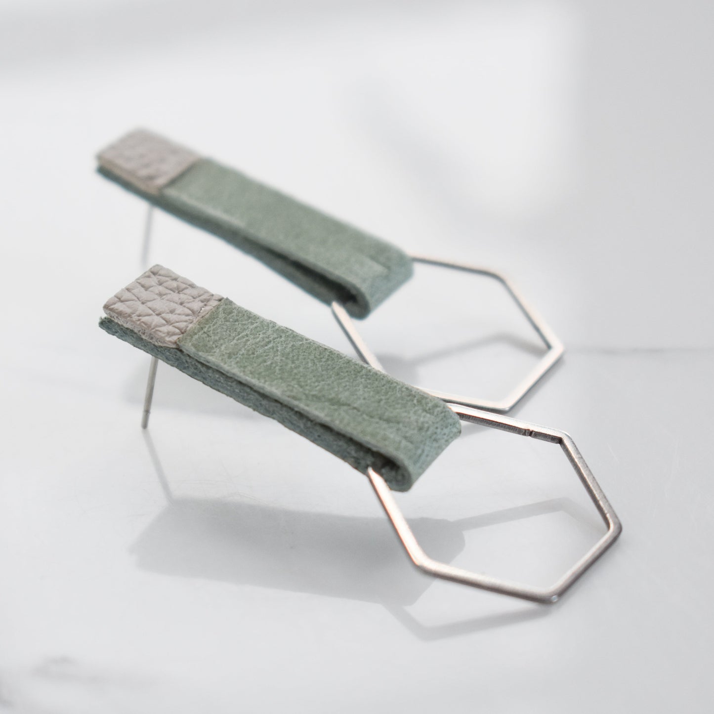 Handmade, light weight and comfortable to wear all day long leather earrings. All our earring hooks are made with a high quality stainless steel and they are hypo allergenic. They will not tarnish or irritate your sensitive skin.