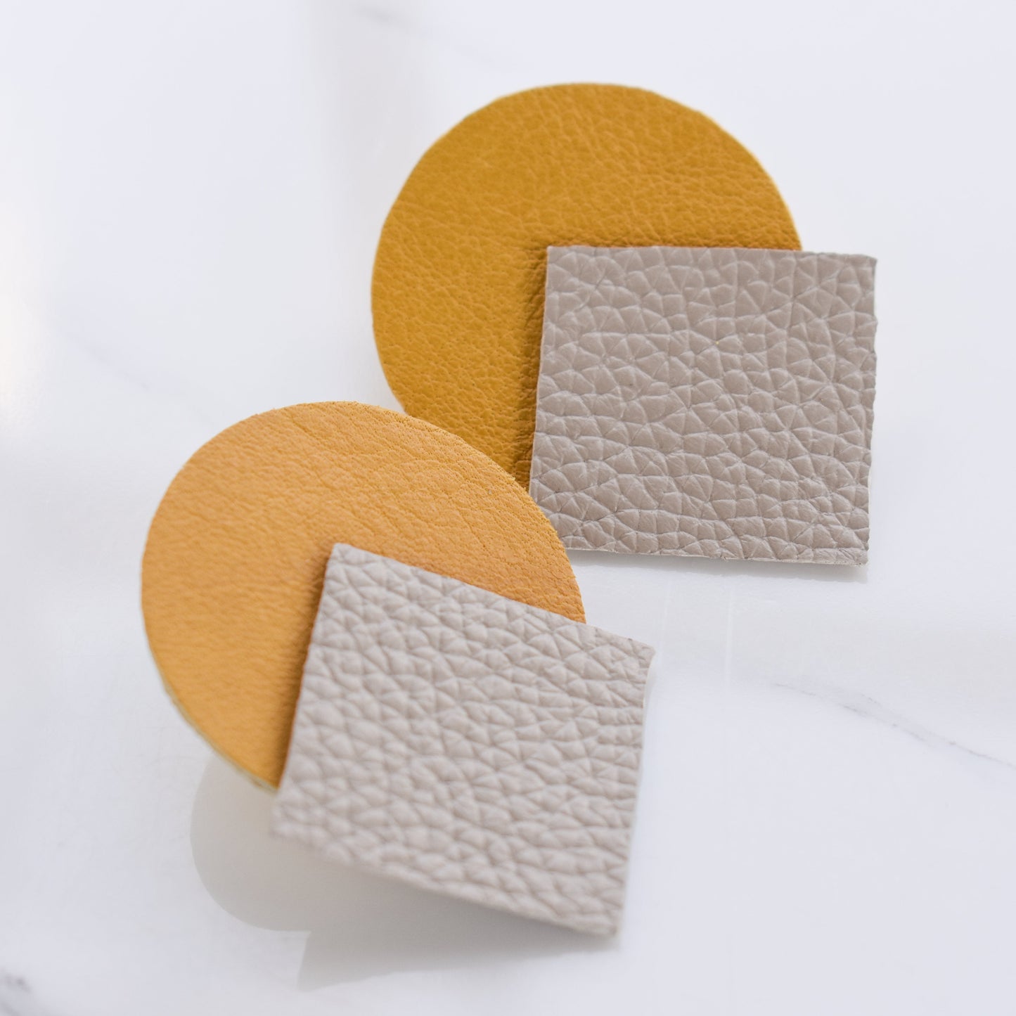 Handmade, light weight and comfortable to wear all day long leather earrings. All our earring hooks are made with a high quality stainless steel and they are hypo allergenic. They will not tarnish or irritate your sensitive skin.