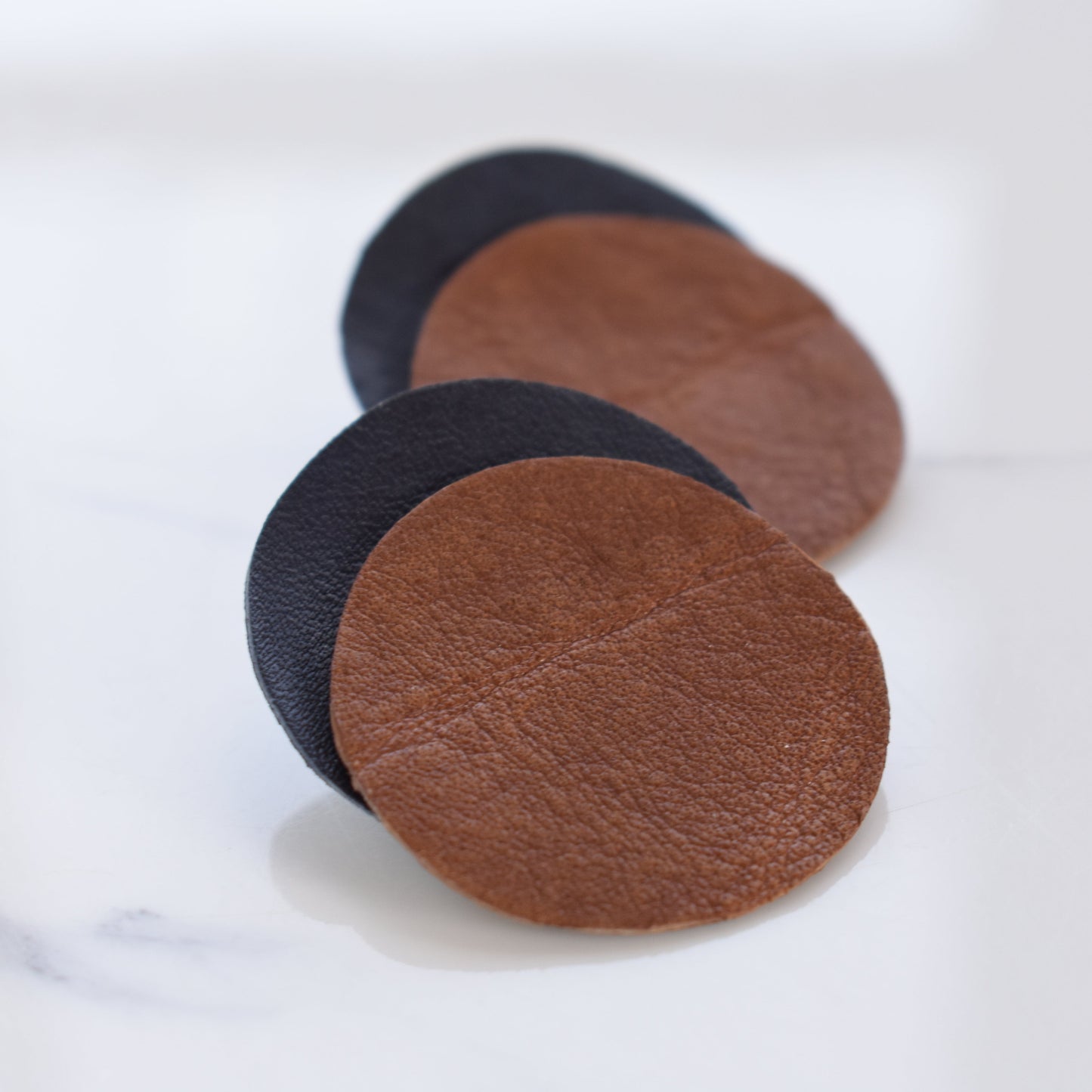 Handmade, light weight and comfortable to wear all day long leather earrings. All our earring hooks are made with a high quality stainless steel and they are hypo allergenic. They will not tarnish or irritate your sensitive skin.