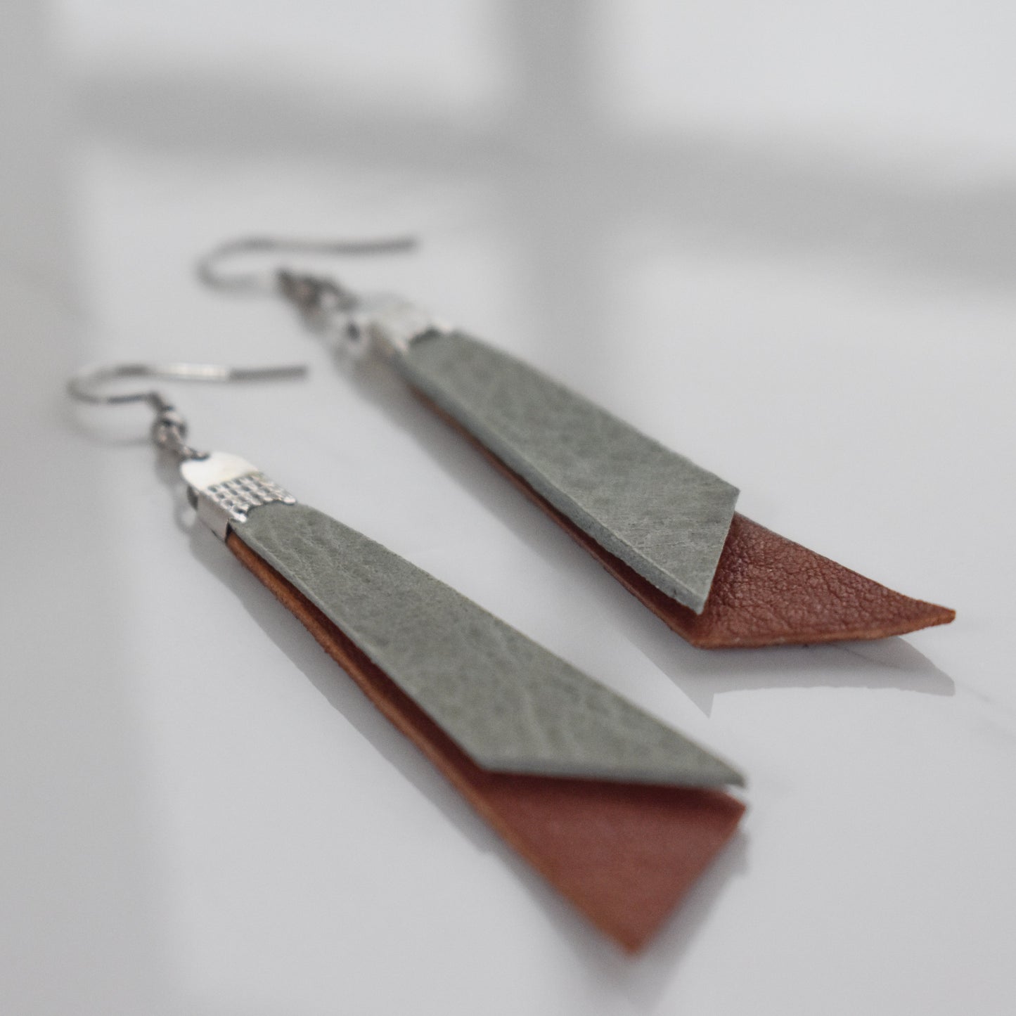 Handmade, light weight and comfortable to wear all day long leather earrings. All our earring hooks are made with a high quality stainless steel and they are hypo allergenic. They will not tarnish or irritate your sensitive skin.