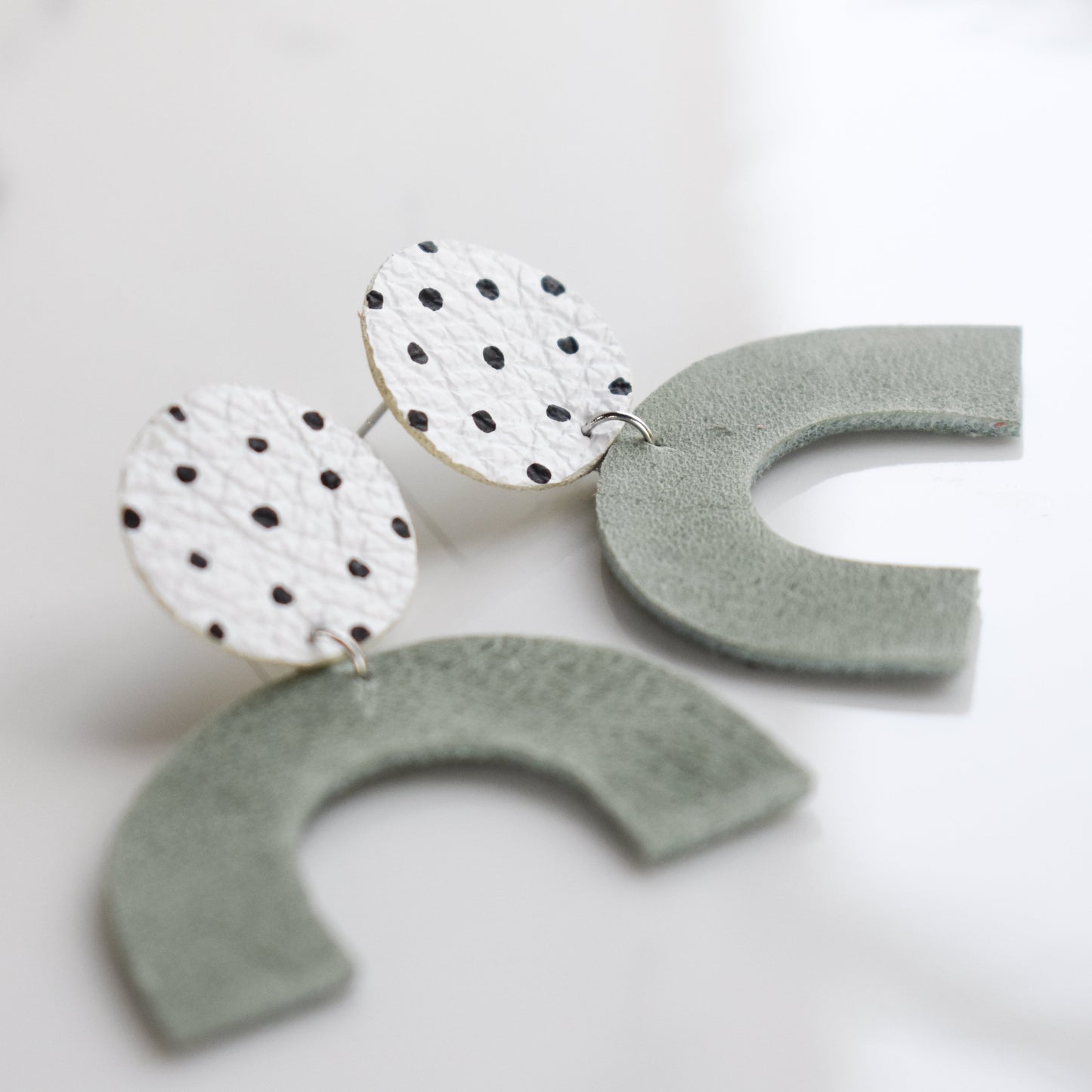 Handmade, light weight and comfortable to wear all day long leather earrings. All our earring hooks are made with a high quality stainless steel and they are hypo allergenic. They will not tarnish or irritate your sensitive skin.
