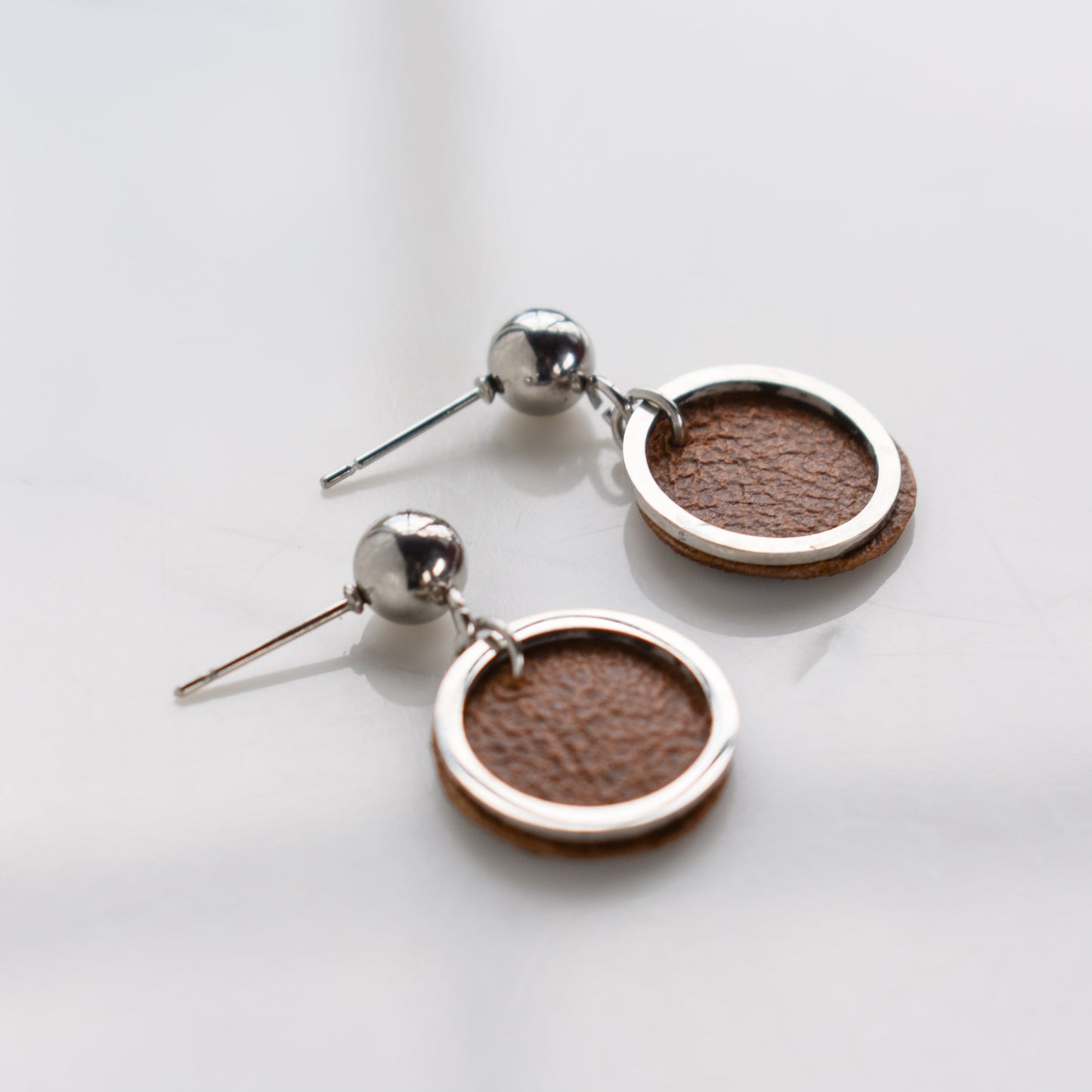 Handmade, light weight and comfortable to wear all day long leather earrings. All our earring hooks are made with a high quality stainless steel and they are hypo allergenic. They will not tarnish or irritate your sensitive skin.