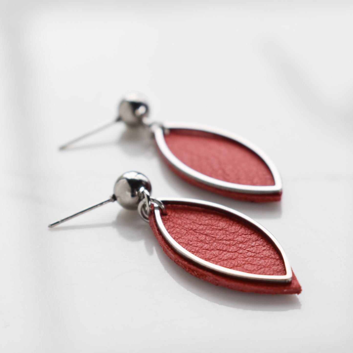 Handmade, light weight and comfortable to wear all day long leather earrings. All our earring hooks are made with a high quality stainless steel and they are hypo allergenic. They will not tarnish or irritate your sensitive skin.