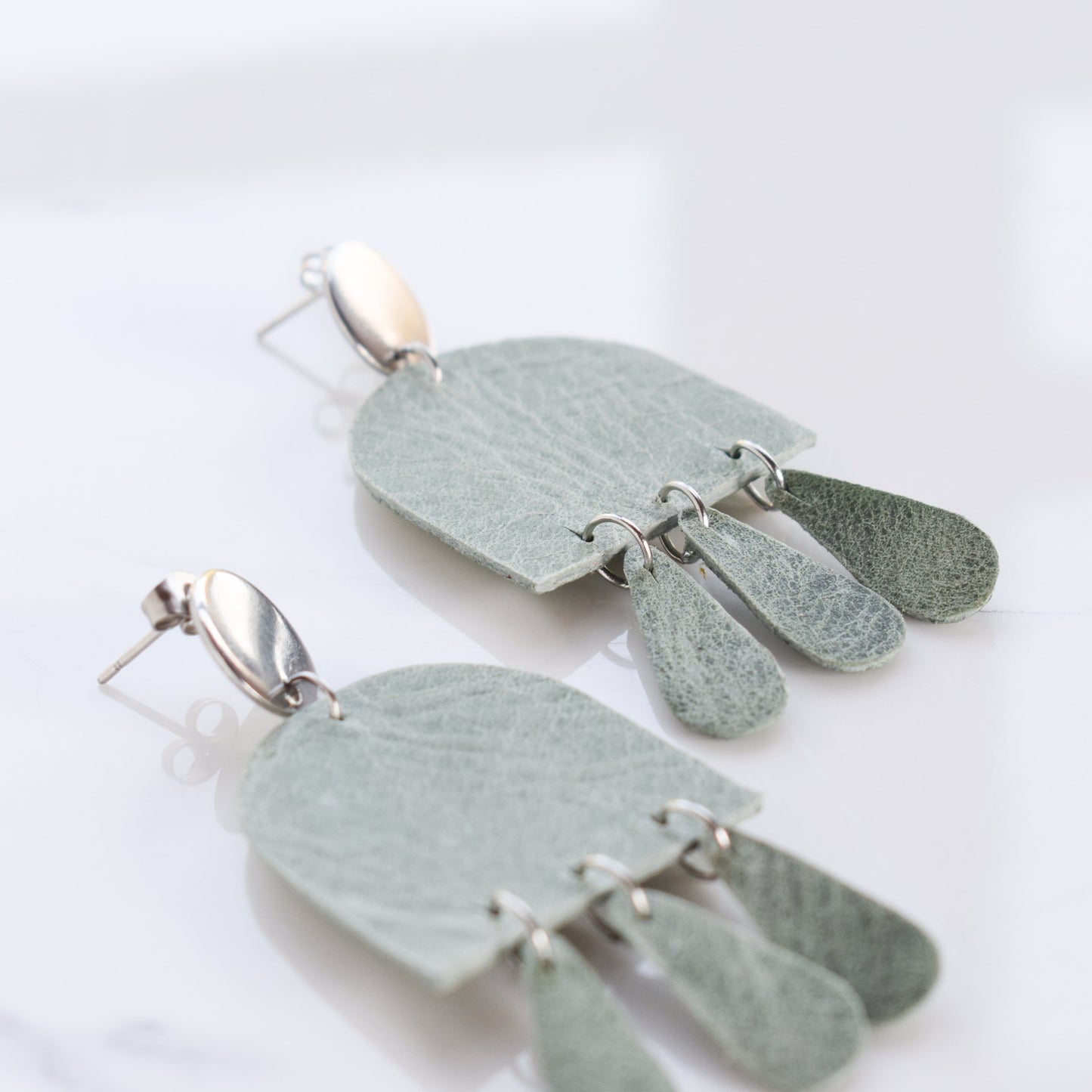 Handmade, light weight and comfortable to wear all day long leather earrings. All our earring hooks are made with a high quality stainless steel and they are hypo allergenic. They will not tarnish or irritate your sensitive skin.