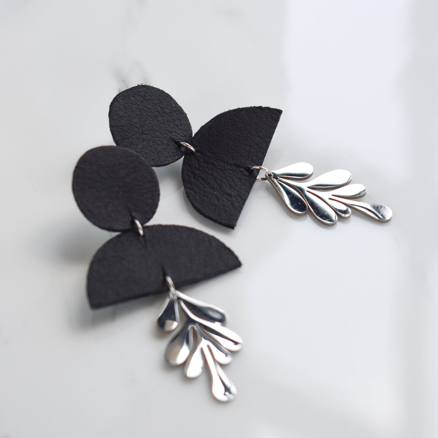 Handmade, light weight and comfortable to wear all day long leather earrings. All our earring hooks are made with a high quality stainless steel and they are hypo allergenic. They will not tarnish or irritate your sensitive skin.
