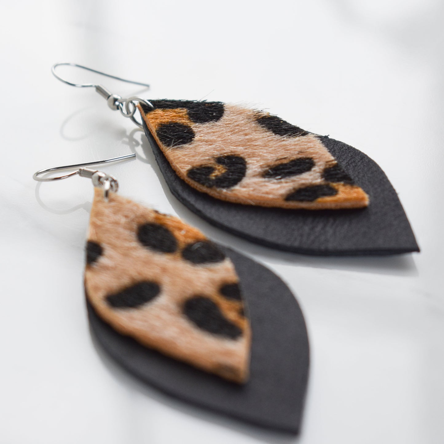 Handmade, light weight and comfortable to wear all day long leather earrings. All our earring hooks are made with a high quality stainless steel and they are hypo allergenic. They will not tarnish or irritate your sensitive skin.