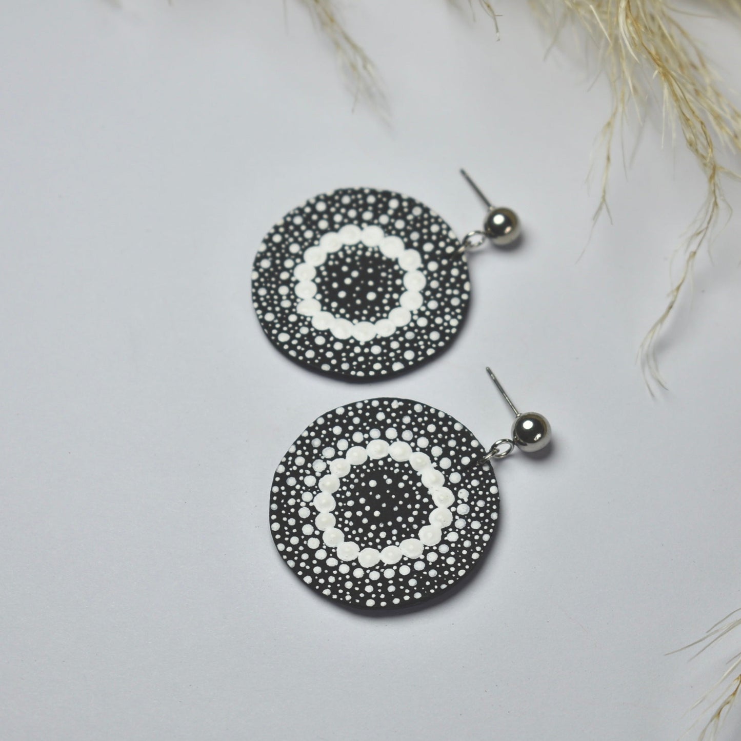 Handmade, light weight and comfortable to wear all day long leather earrings. All our earring hooks are made with a high quality stainless steel and they are hypo allergenic. They will not tarnish or irritate your sensitive skin.