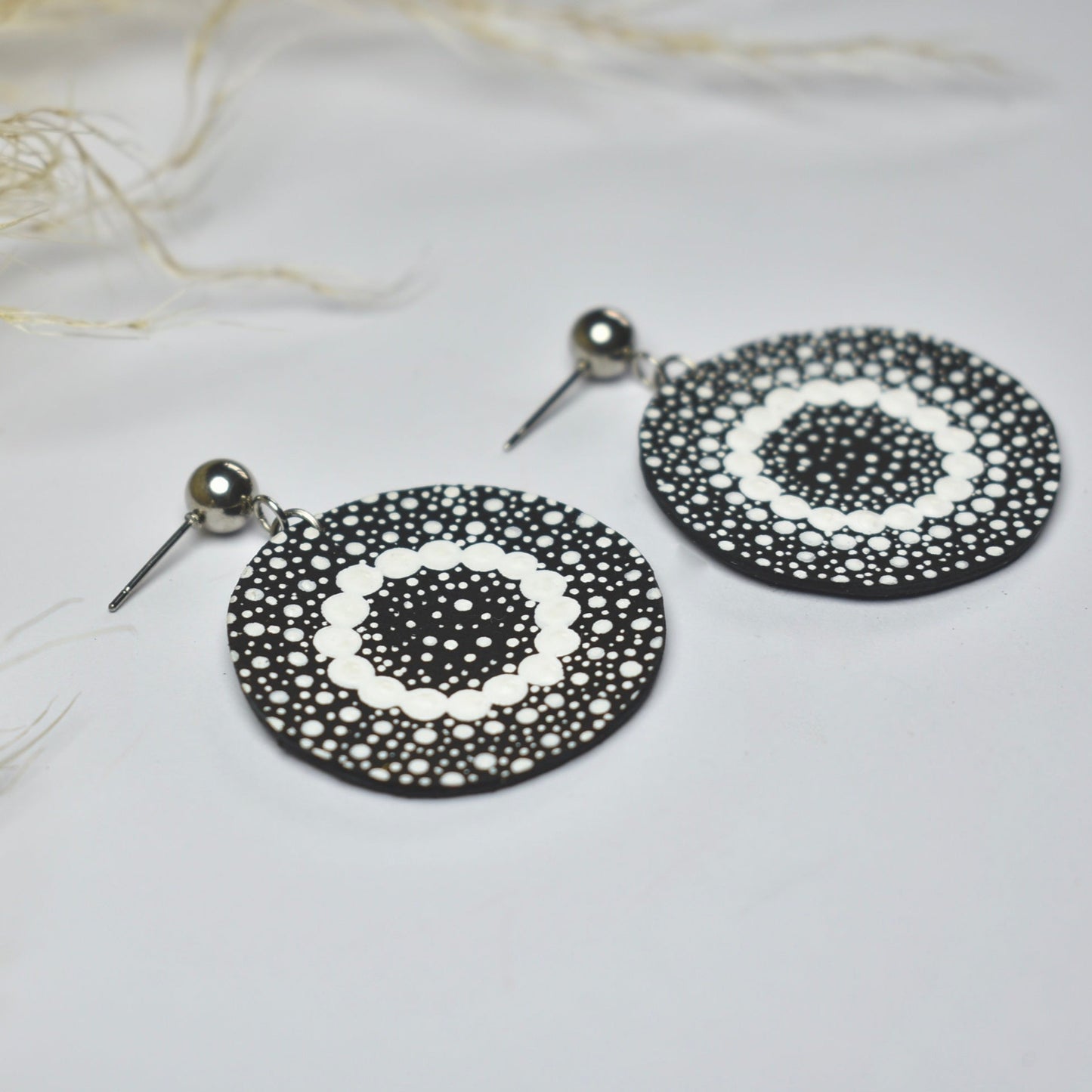 Handmade, light weight and comfortable to wear all day long leather earrings. All our earring hooks are made with a high quality stainless steel and they are hypo allergenic. They will not tarnish or irritate your sensitive skin.