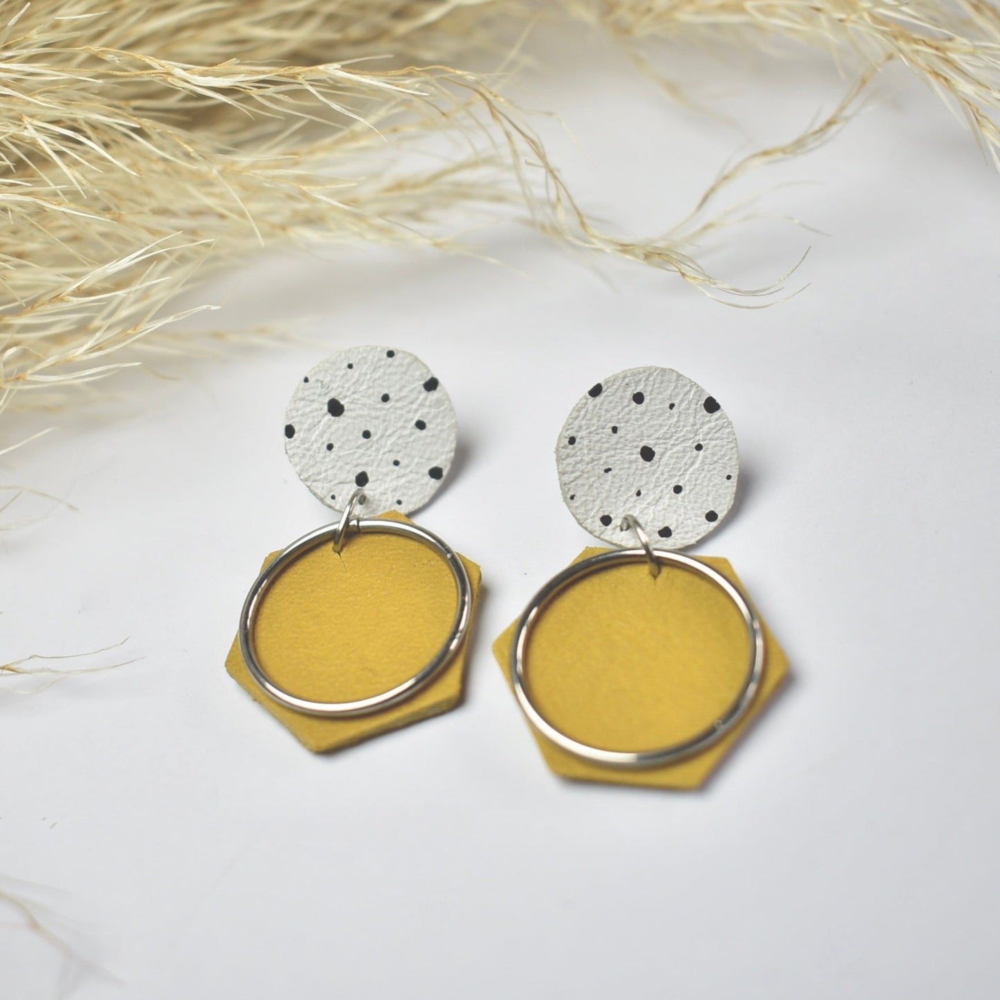 Handmade, light weight and comfortable to wear all day long leather earrings. All our earring hooks are made with a high quality stainless steel and they are hypo allergenic. They will not tarnish or irritate your sensitive skin.