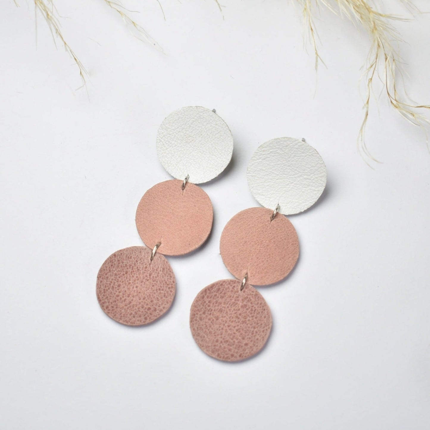 Handmade, light weight and comfortable to wear all day long leather earrings. All our earring hooks are made with a high quality stainless steel and they are hypo allergenic. They will not tarnish or irritate your sensitive skin.
