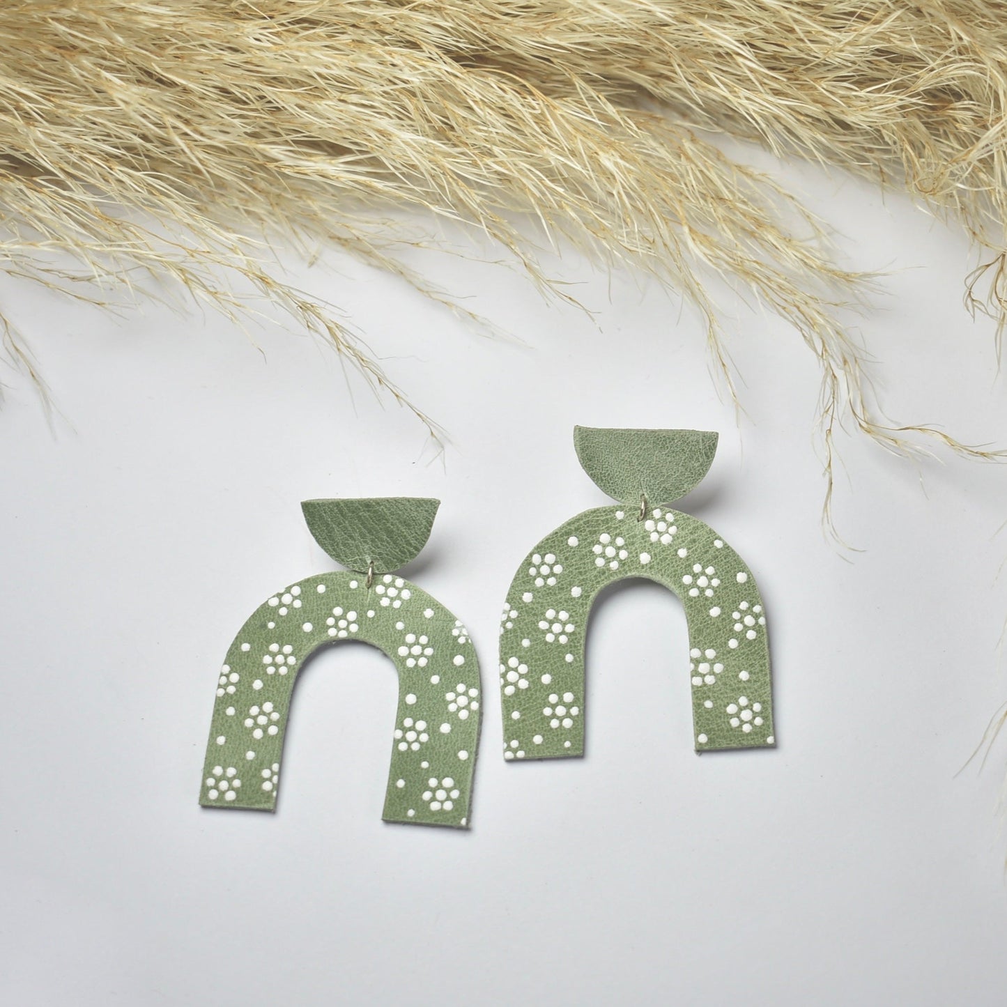 Handmade, light weight and comfortable to wear all day long leather earrings. All our earring hooks are made with a high quality stainless steel and they are hypo allergenic. They will not tarnish or irritate your sensitive skin.