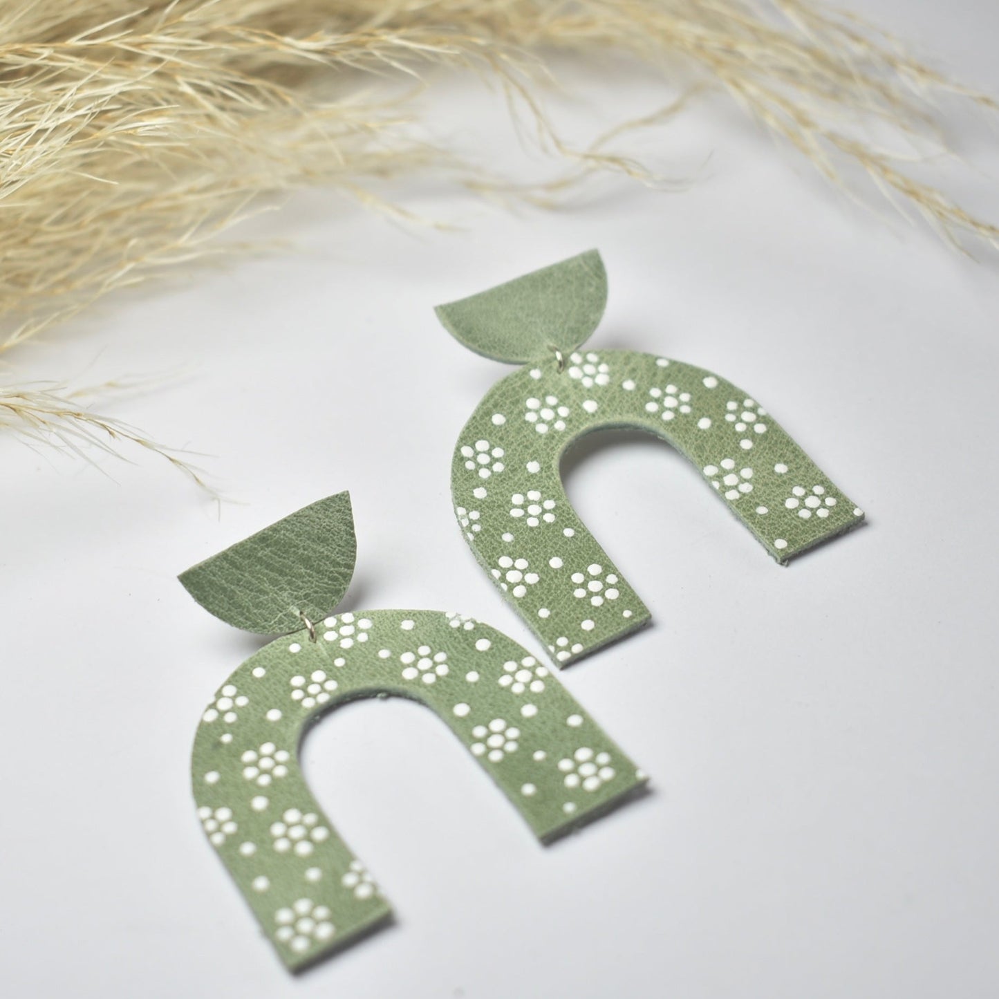 Handmade, light weight and comfortable to wear all day long leather earrings. All our earring hooks are made with a high quality stainless steel and they are hypo allergenic. They will not tarnish or irritate your sensitive skin.