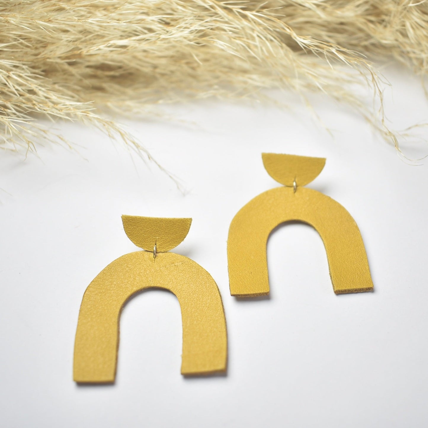 Handmade, light weight and comfortable to wear all day long leather earrings. All our earring hooks are made with a high quality stainless steel and they are hypo allergenic. They will not tarnish or irritate your sensitive skin.