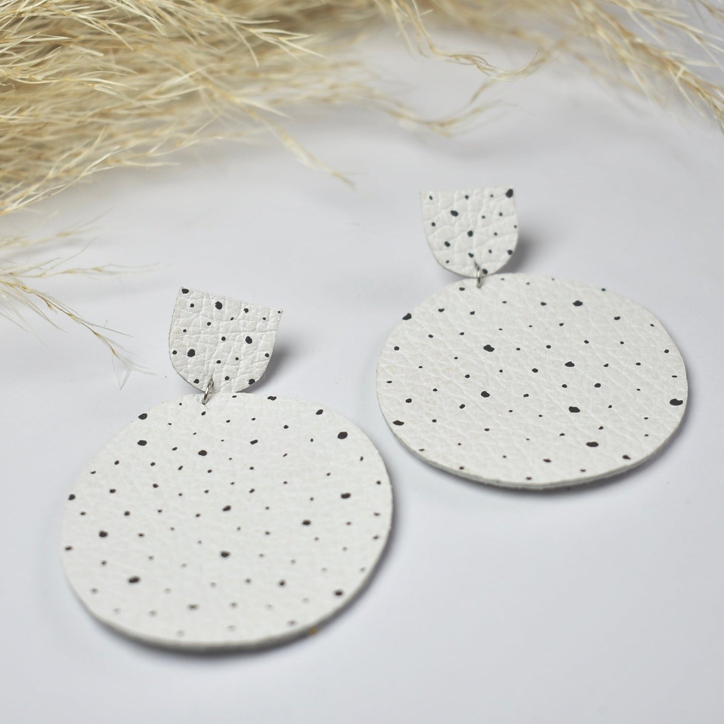 Handmade, light weight and comfortable to wear all day long leather earrings. All our earring hooks are made with a high quality stainless steel and they are hypo allergenic. They will not tarnish or irritate your sensitive skin.