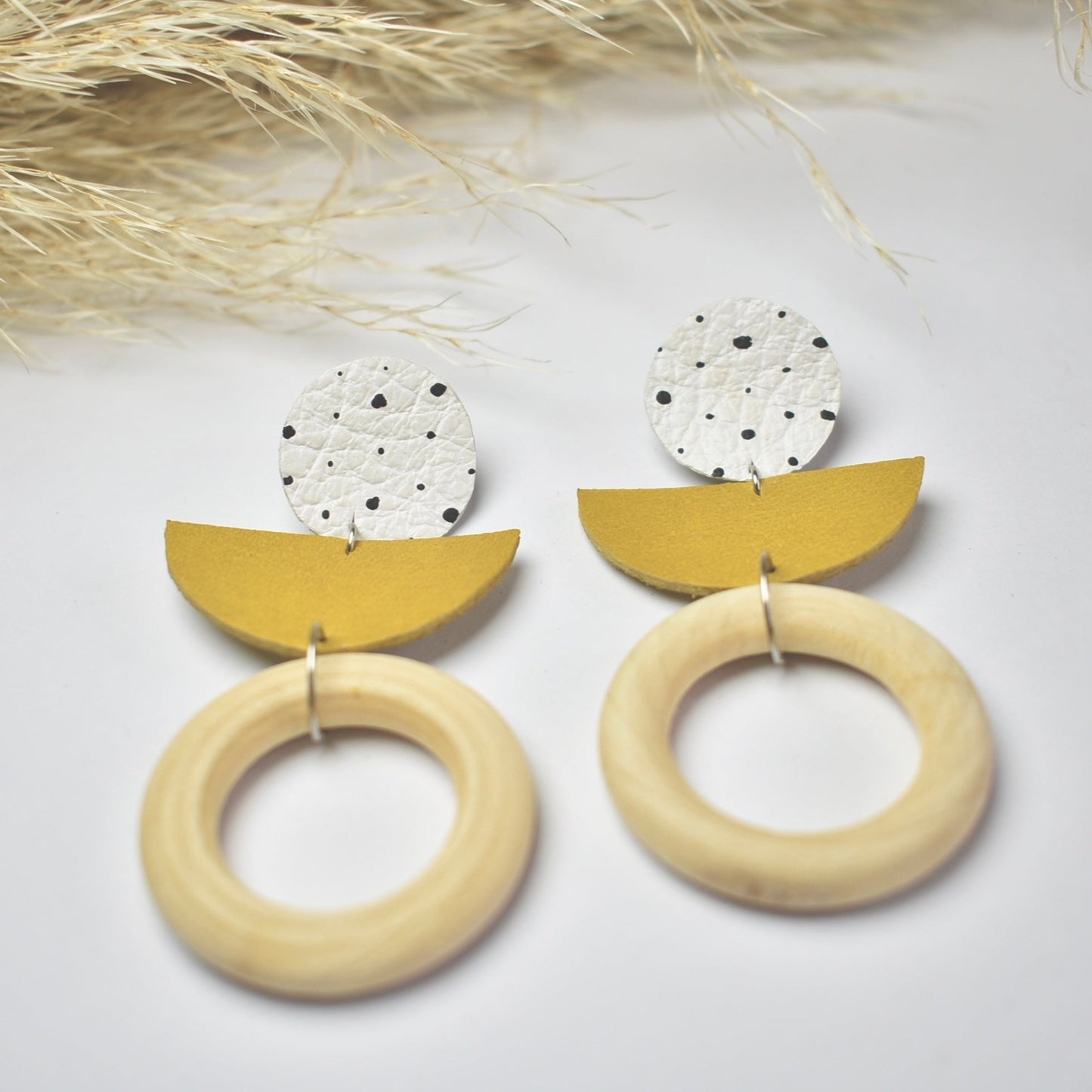 Handmade, light weight and comfortable to wear all day long leather earrings. All our earring hooks are made with a high quality stainless steel and they are hypo allergenic. They will not tarnish or irritate your sensitive skin.