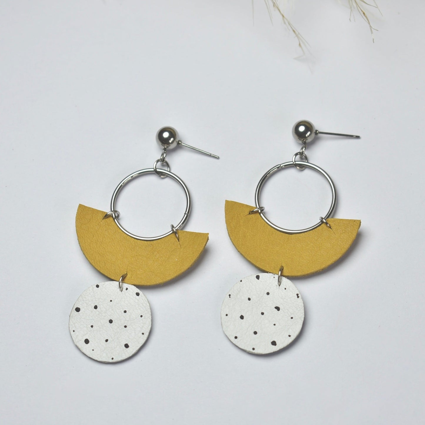 Handmade, light weight and comfortable to wear all day long leather earrings. All our earring hooks are made with a high quality stainless steel and they are hypo allergenic. They will not tarnish or irritate your sensitive skin.