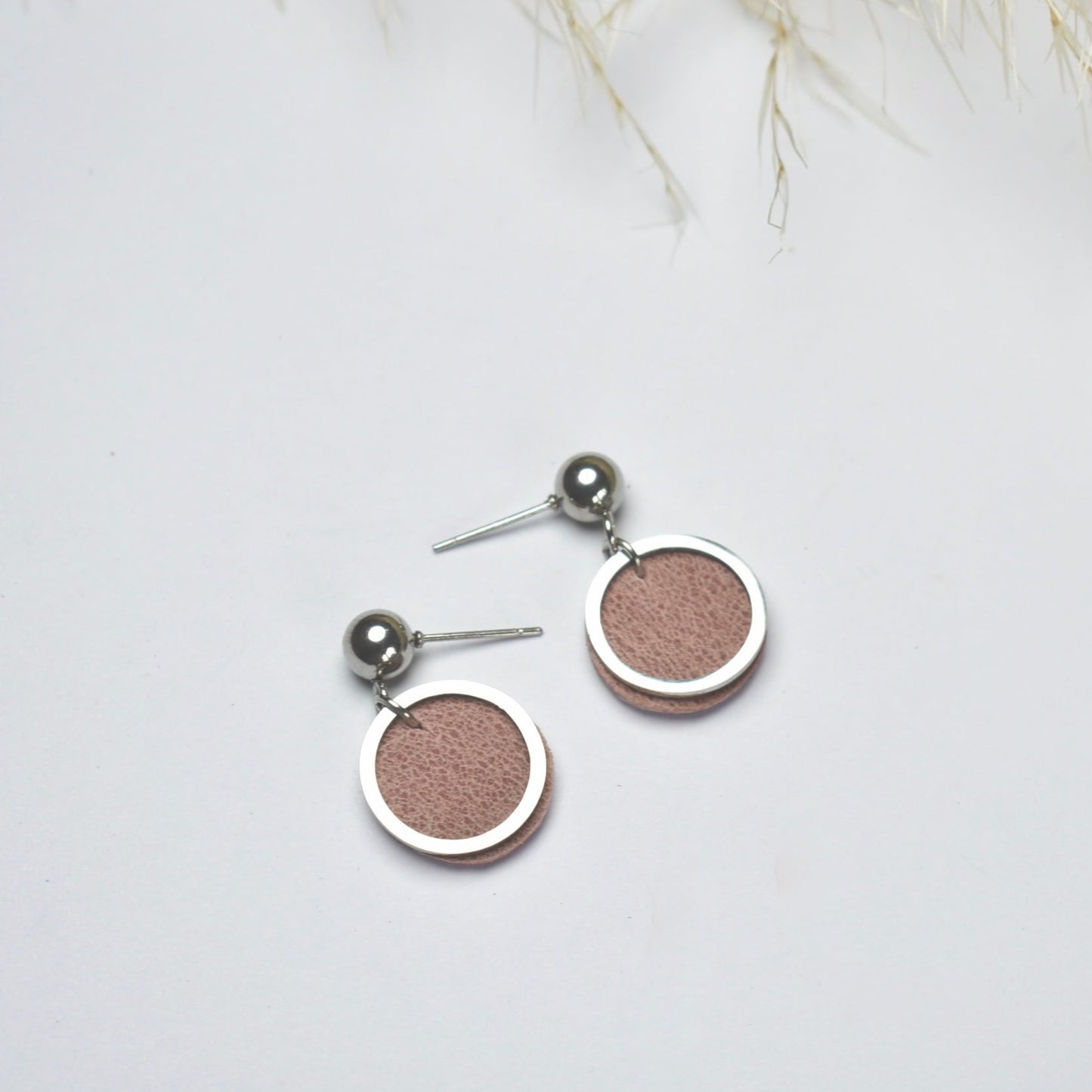 Handmade, light weight and comfortable to wear all day long leather earrings. All our earring hooks are made with a high quality stainless steel and they are hypo allergenic. They will not tarnish or irritate your sensitive skin.