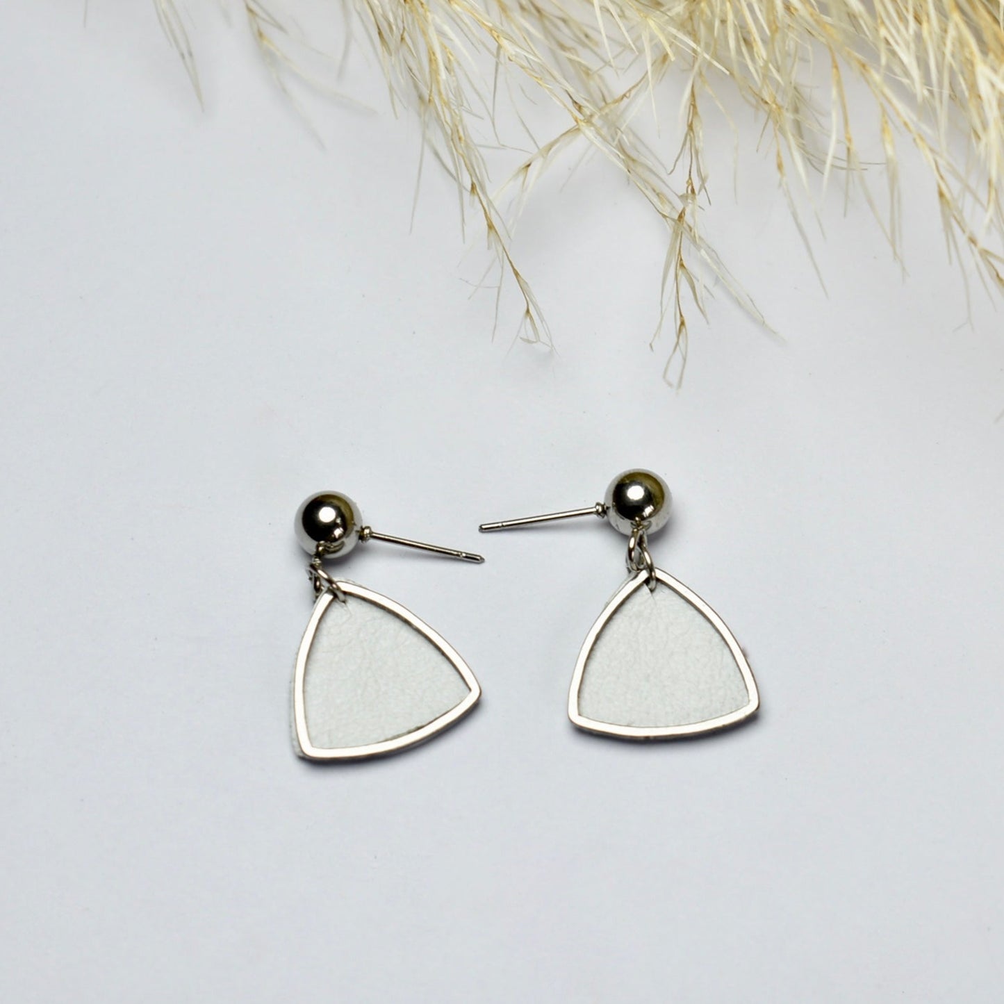 Handmade, light weight and comfortable to wear all day long leather earrings. All our earring hooks are made with a high quality stainless steel and they are hypo allergenic. They will not tarnish or irritate your sensitive skin.