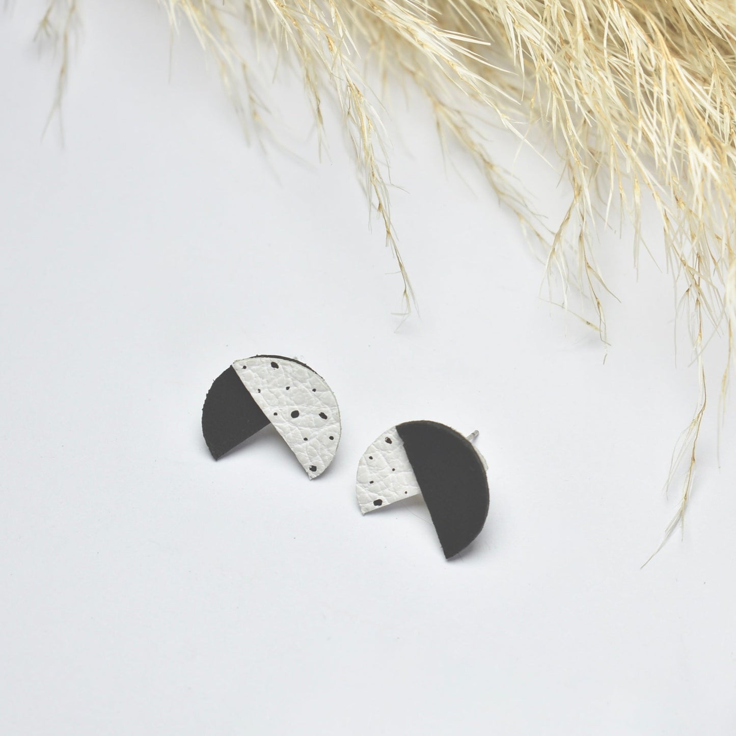 Handmade, light weight and comfortable to wear all day long leather earrings. All our earring hooks are made with a high quality stainless steel and they are hypo allergenic. They will not tarnish or irritate your sensitive skin.