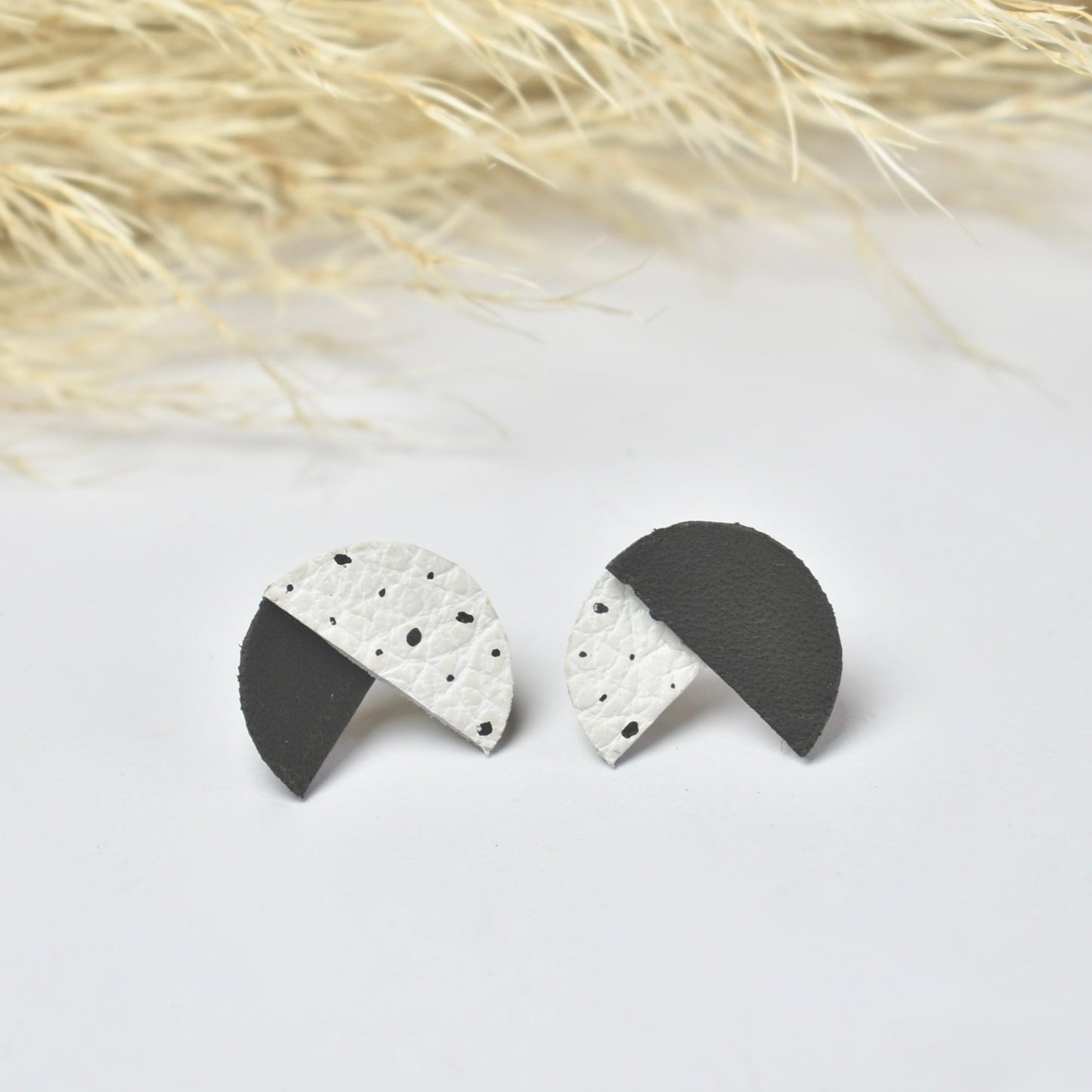 Handmade, light weight and comfortable to wear all day long leather earrings. All our earring hooks are made with a high quality stainless steel and they are hypo allergenic. They will not tarnish or irritate your sensitive skin.