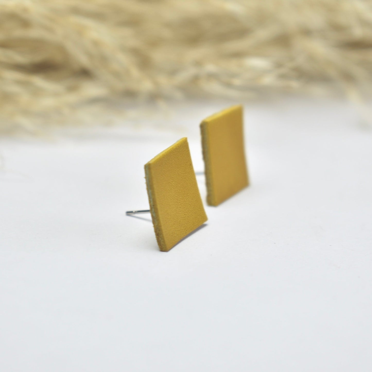 Handmade, light weight and comfortable to wear all day long leather earrings. All our earring hooks are made with a high quality stainless steel and they are hypo allergenic. They will not tarnish or irritate your sensitive skin.