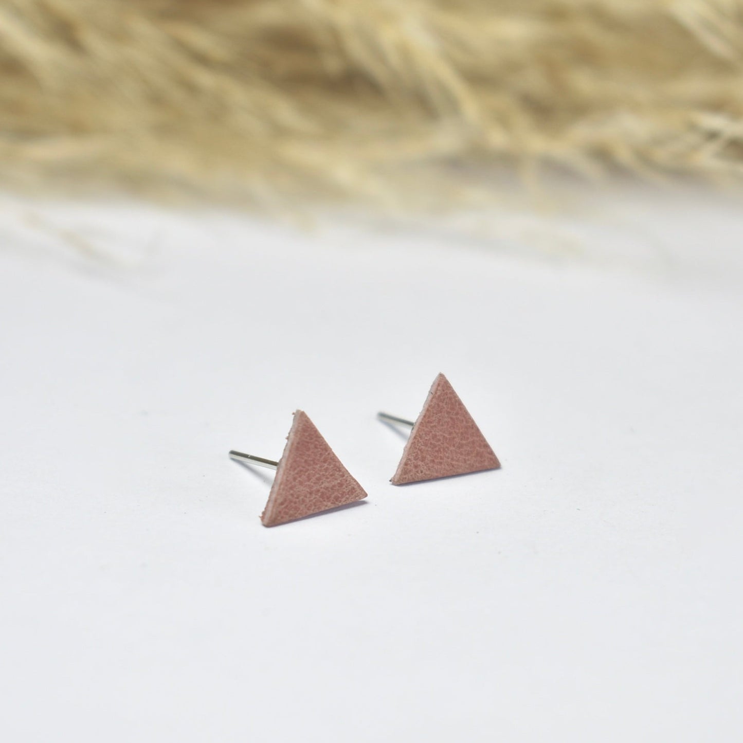 Handmade, light weight and comfortable to wear all day long leather earrings. All our earring hooks are made with a high quality stainless steel and they are hypo allergenic. They will not tarnish or irritate your sensitive skin.