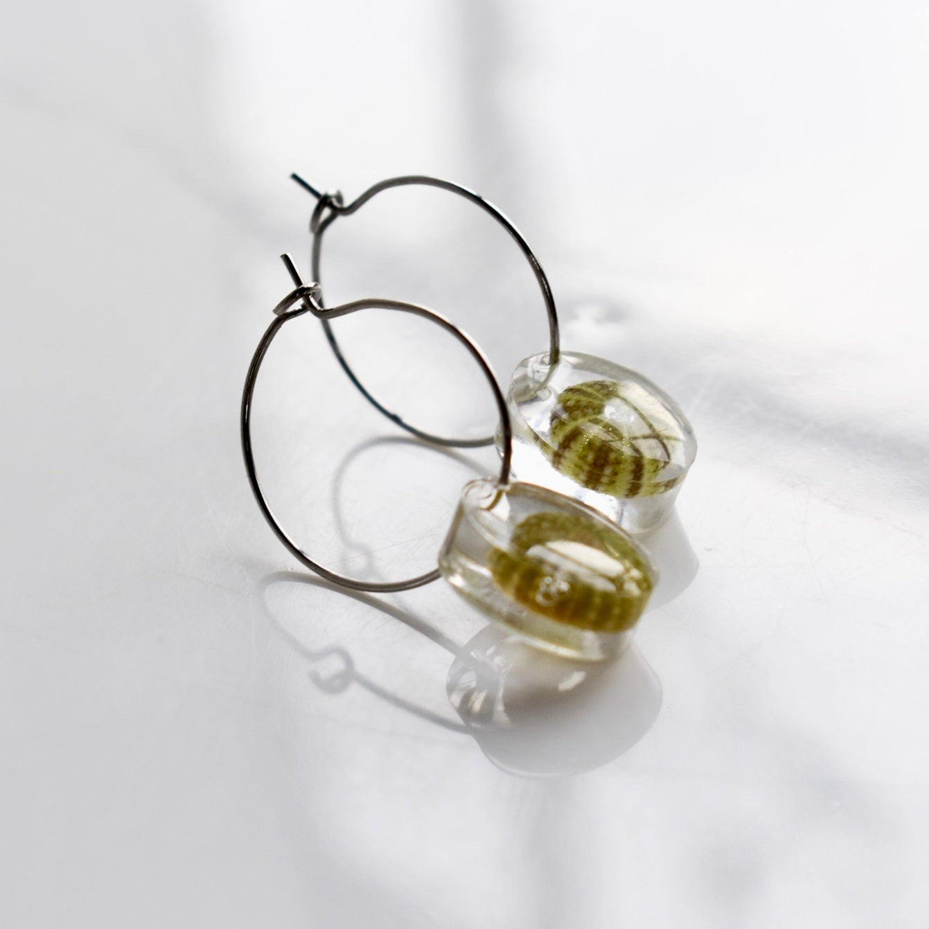 Handmade, light weight and comfortable to wear all day long leather earrings. All our earring hooks are made with a high quality stainless steel and they are hypo allergenic. They will not tarnish or irritate your sensitive skin.