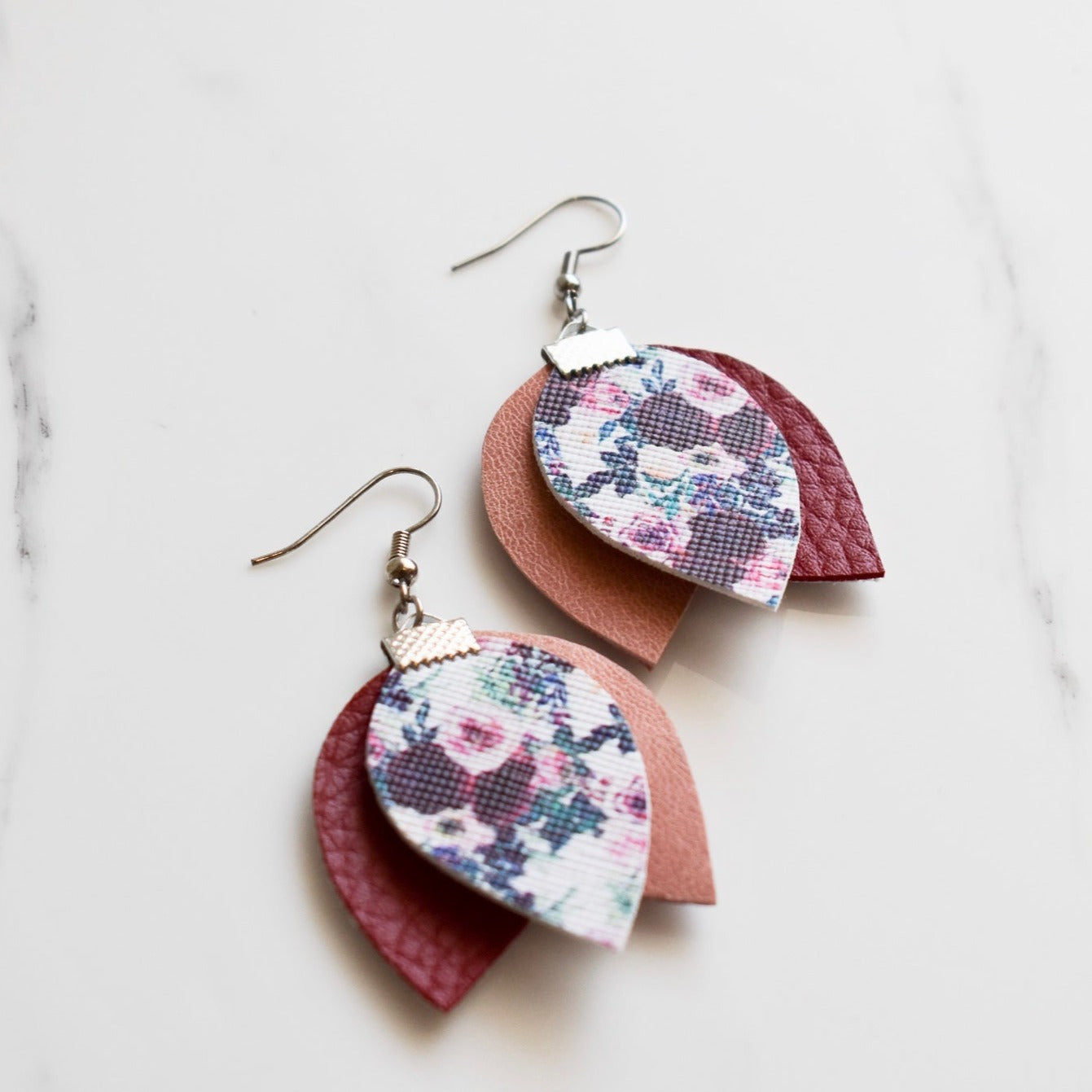 Handmade, light weight and comfortable to wear all day long leather earrings. All our earring hooks are made with a high quality stainless steel and they are hypo allergenic. They will not tarnish or irritate your sensitive skin.