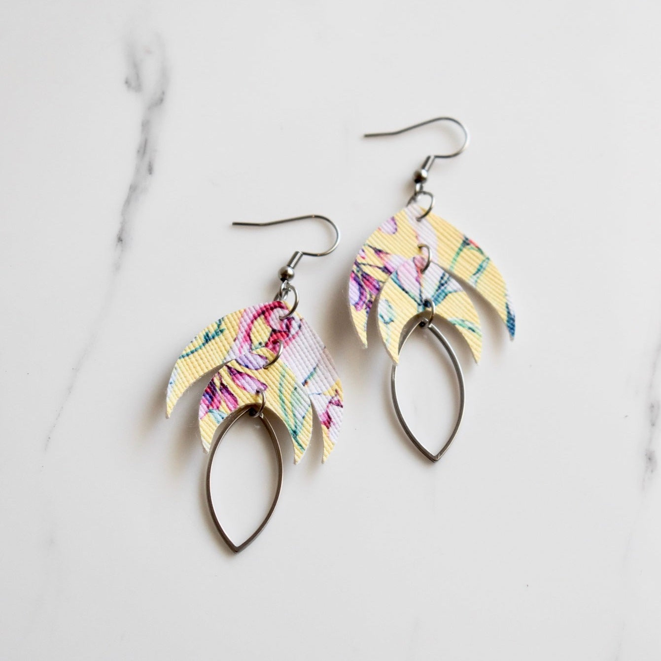 Handmade, light weight and comfortable to wear all day long leather earrings. All our earring hooks are made with a high quality stainless steel and they are hypo allergenic. They will not tarnish or irritate your sensitive skin.
