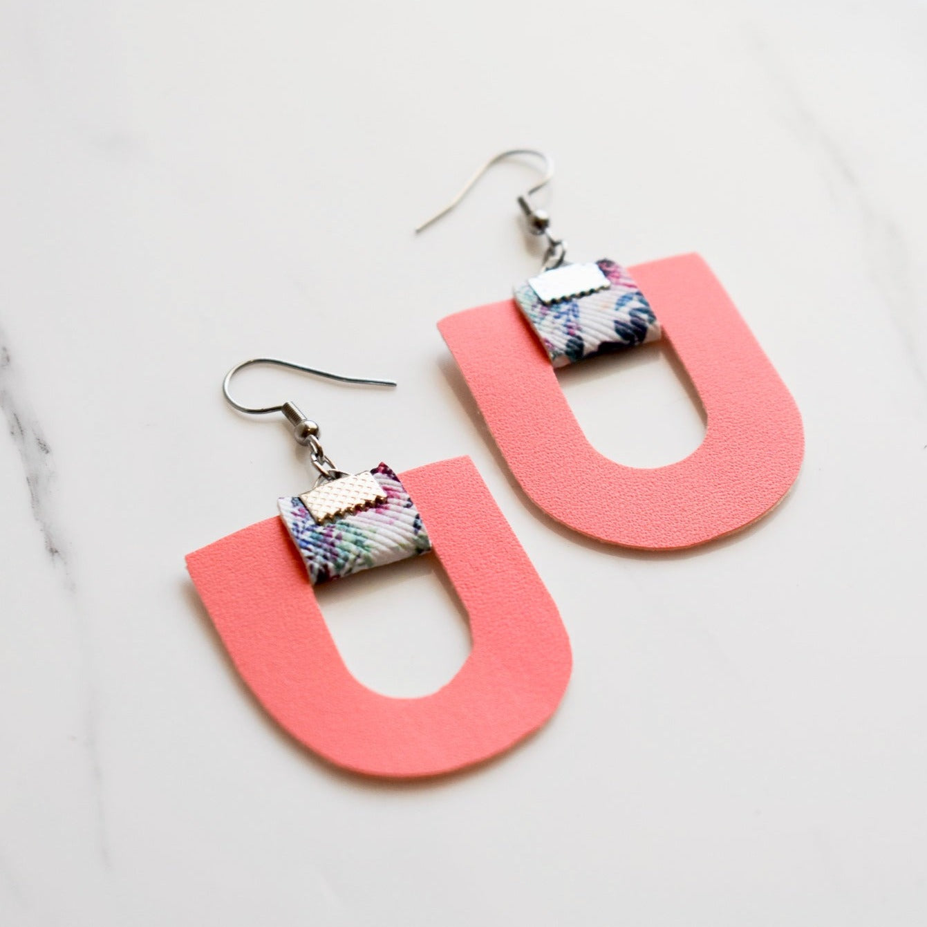 Handmade, light weight and comfortable to wear all day long leather earrings. All our earring hooks are made with a high quality stainless steel and they are hypo allergenic. They will not tarnish or irritate your sensitive skin.