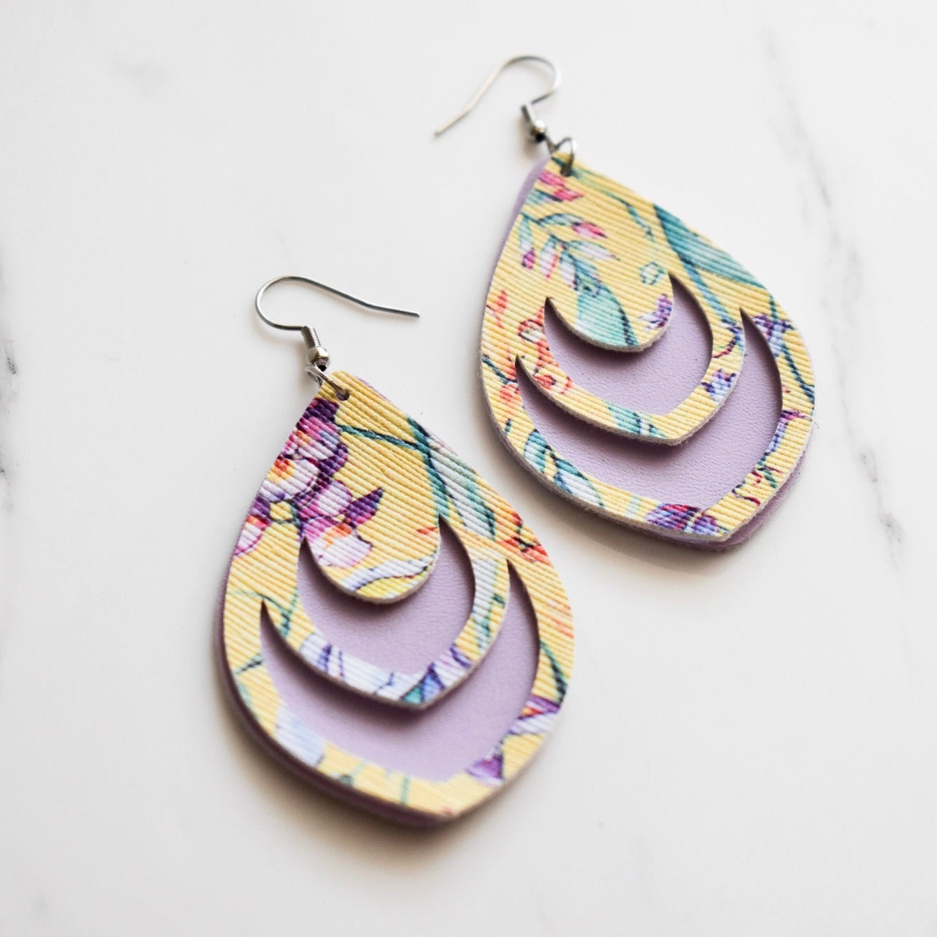 Handmade, light weight and comfortable to wear all day long leather earrings. All our earring hooks are made with a high quality stainless steel and they are hypo allergenic. They will not tarnish or irritate your sensitive skin.