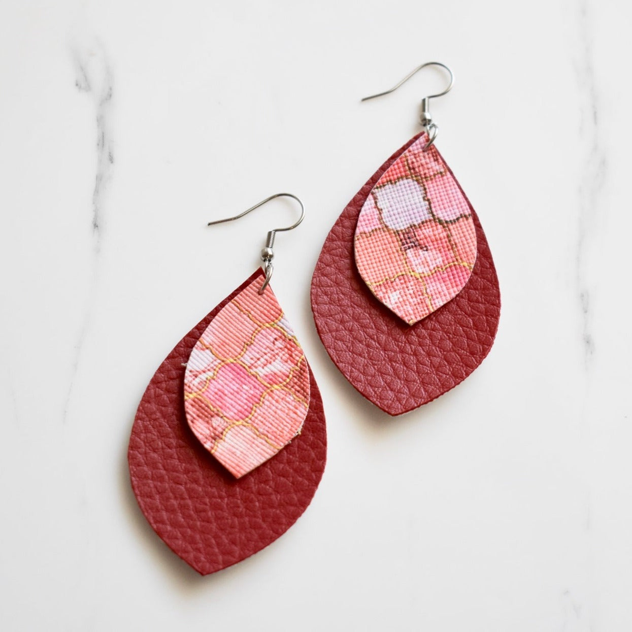 Handmade, light weight and comfortable to wear all day long leather earrings. All our earring hooks are made with a high quality stainless steel and they are hypo allergenic. They will not tarnish or irritate your sensitive skin.