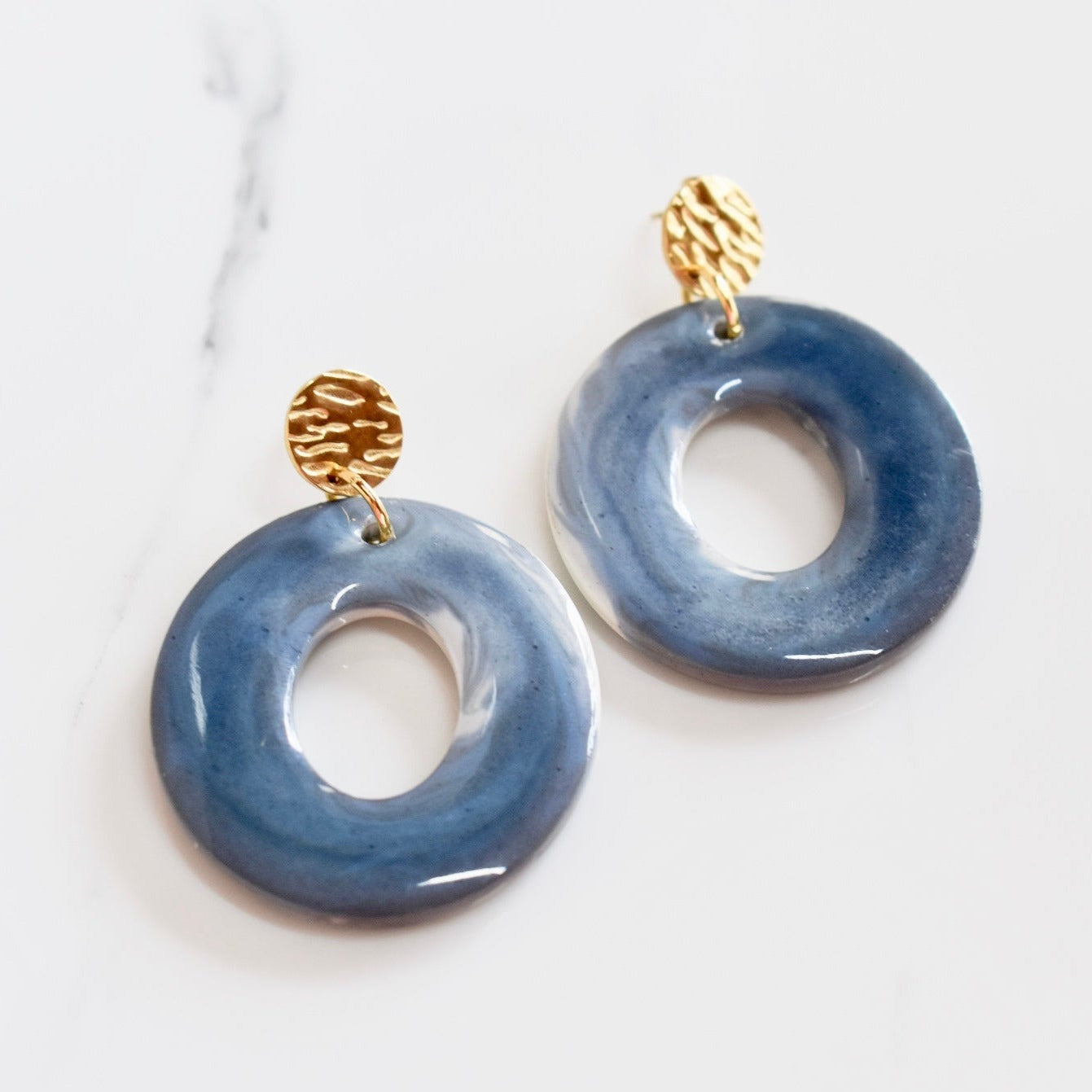 Handmade, light weight and comfortable to wear all day long leather earrings. All our earring hooks are made with a high quality stainless steel and they are hypo allergenic. They will not tarnish or irritate your sensitive skin.