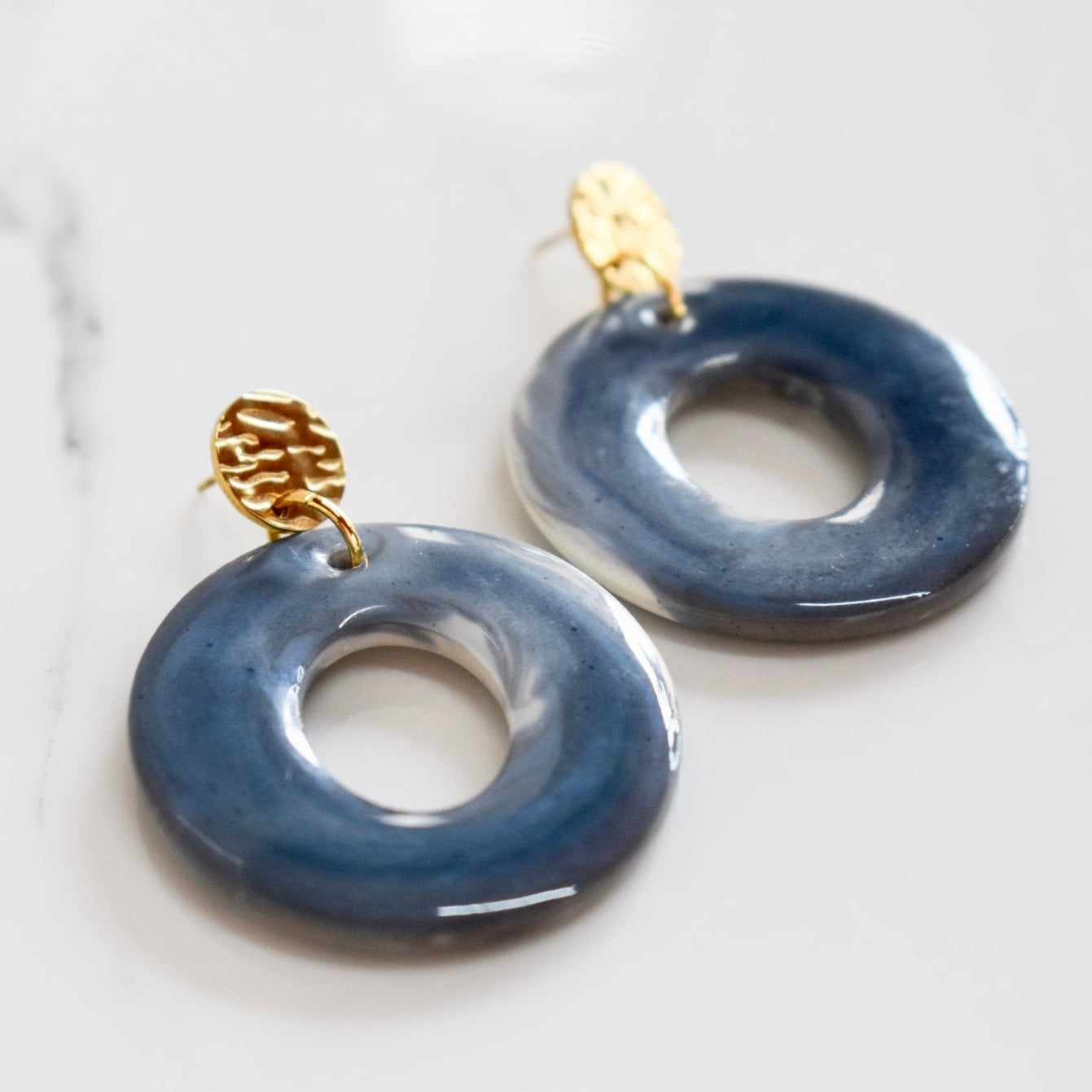 Handmade, light weight and comfortable to wear all day long leather earrings. All our earring hooks are made with a high quality stainless steel and they are hypo allergenic. They will not tarnish or irritate your sensitive skin.