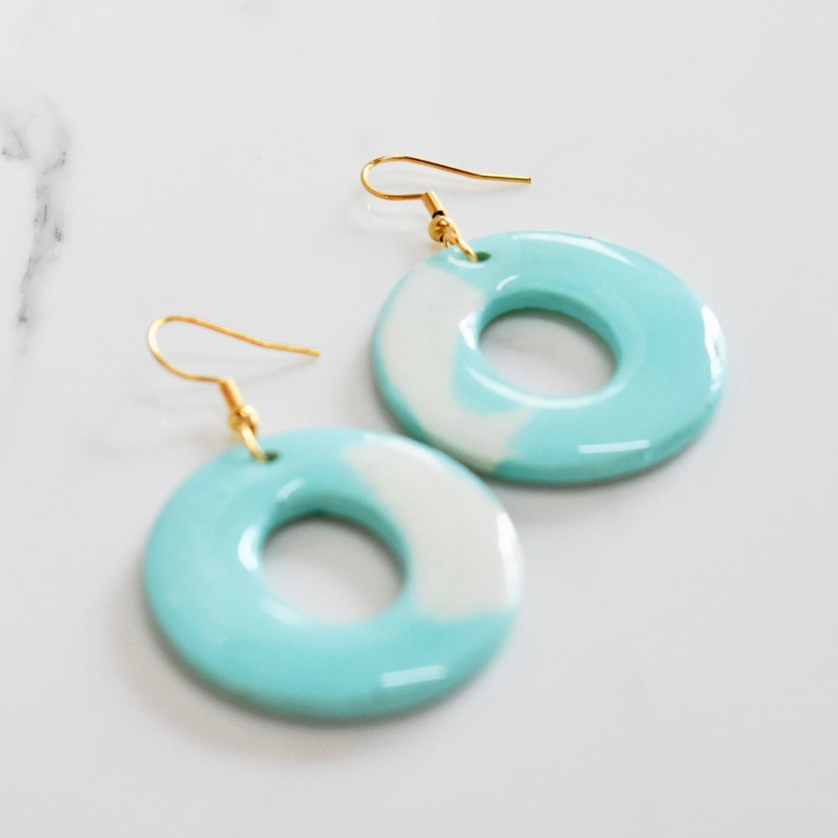 Handmade, light weight and comfortable to wear all day long leather earrings. All our earring hooks are made with a high quality stainless steel and they are hypo allergenic. They will not tarnish or irritate your sensitive skin.