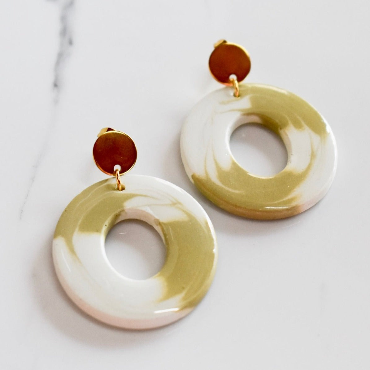 Handmade, light weight and comfortable to wear all day long leather earrings. All our earring hooks are made with a high quality stainless steel and they are hypo allergenic. They will not tarnish or irritate your sensitive skin.